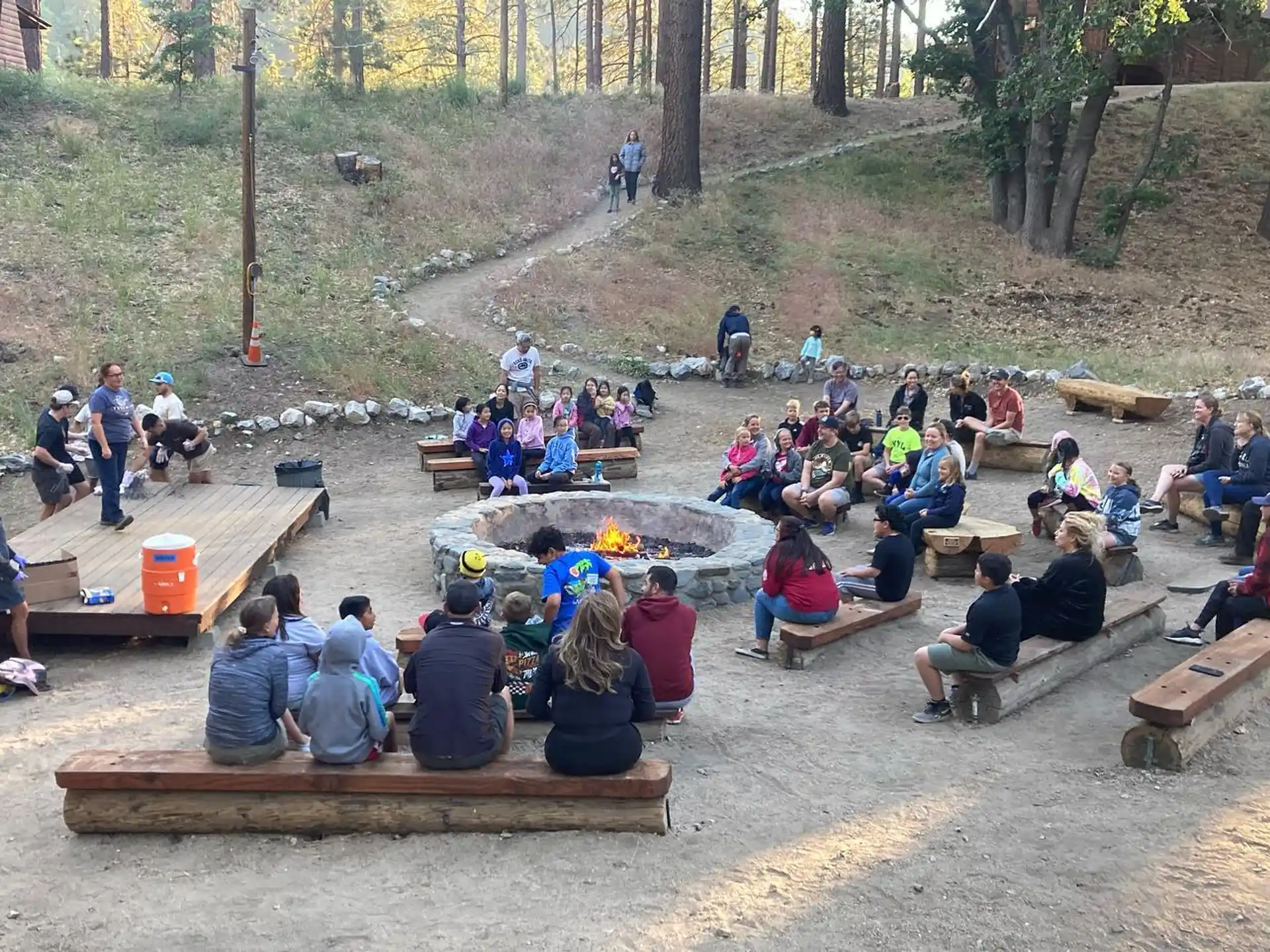 a group of people sitting on benches