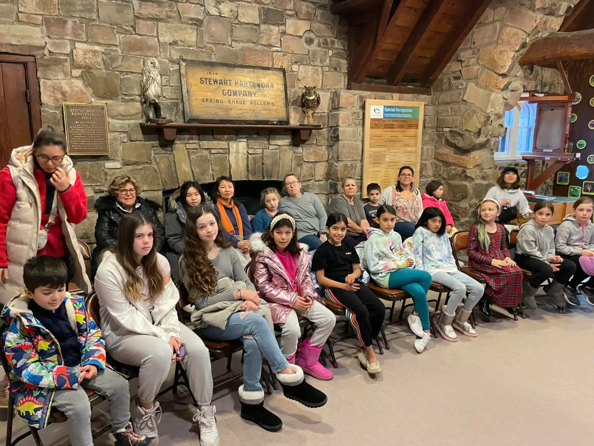 a group of people sitting in a room