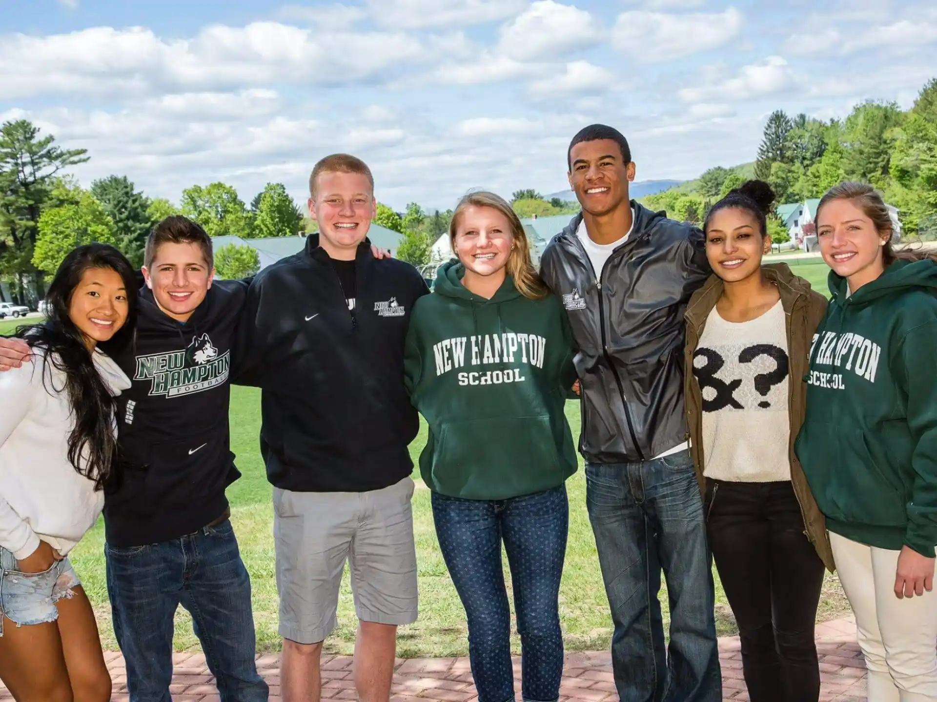 a group of people posing for a photo