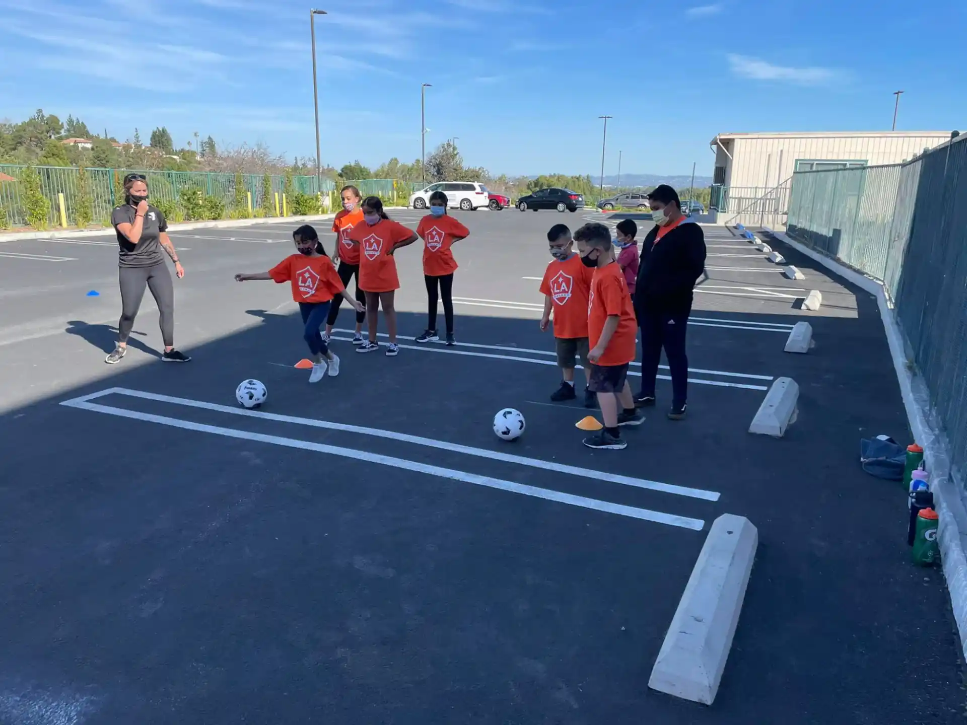a group of kids playing football