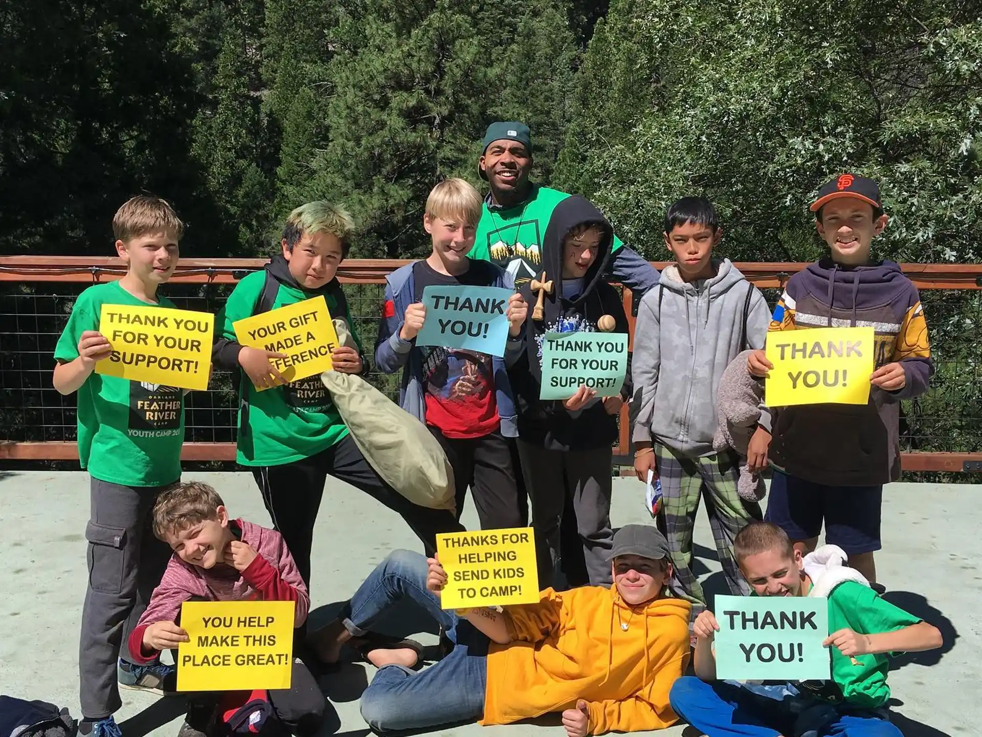 a group of people holding signs
