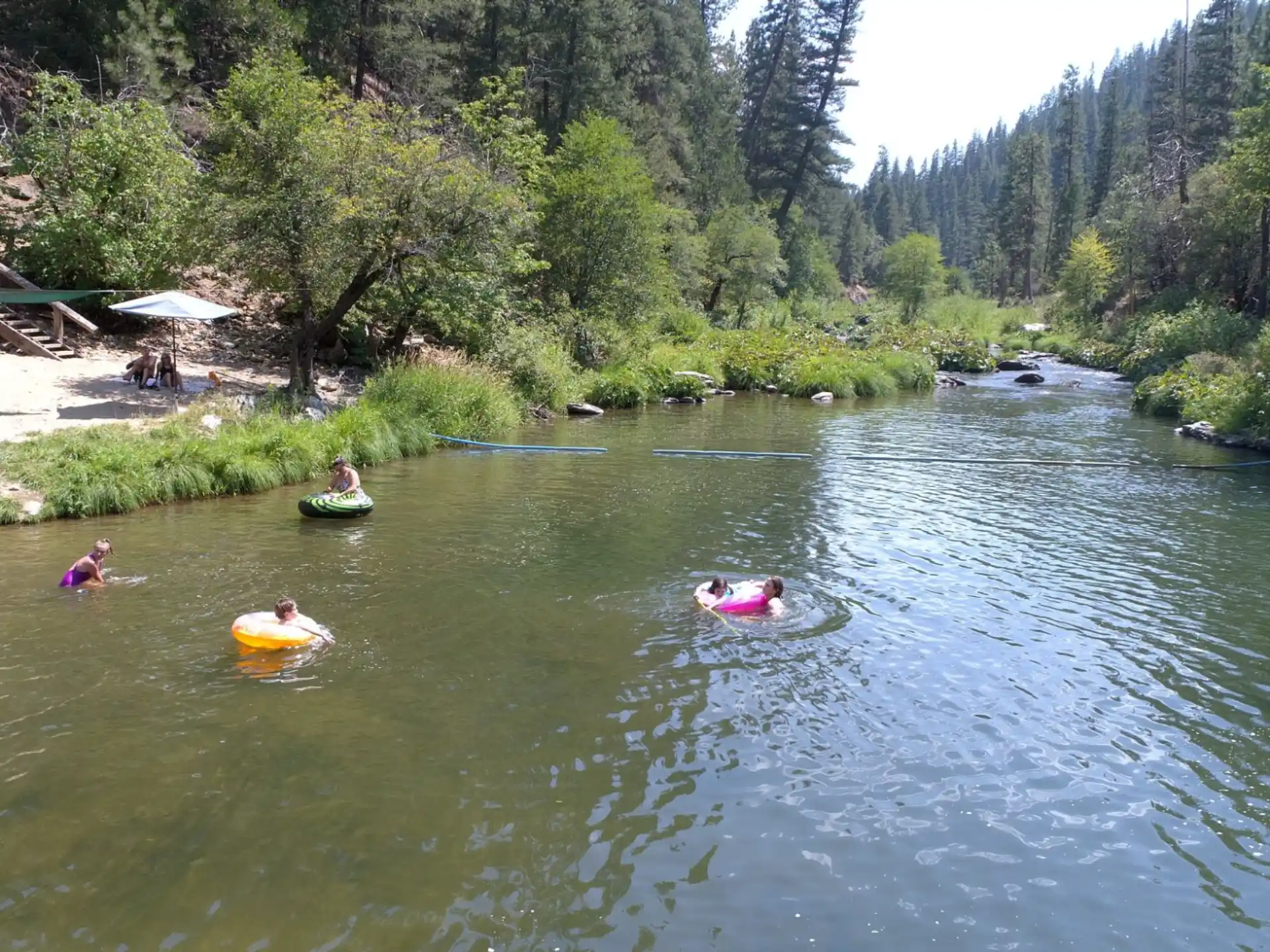 a group of people in a river