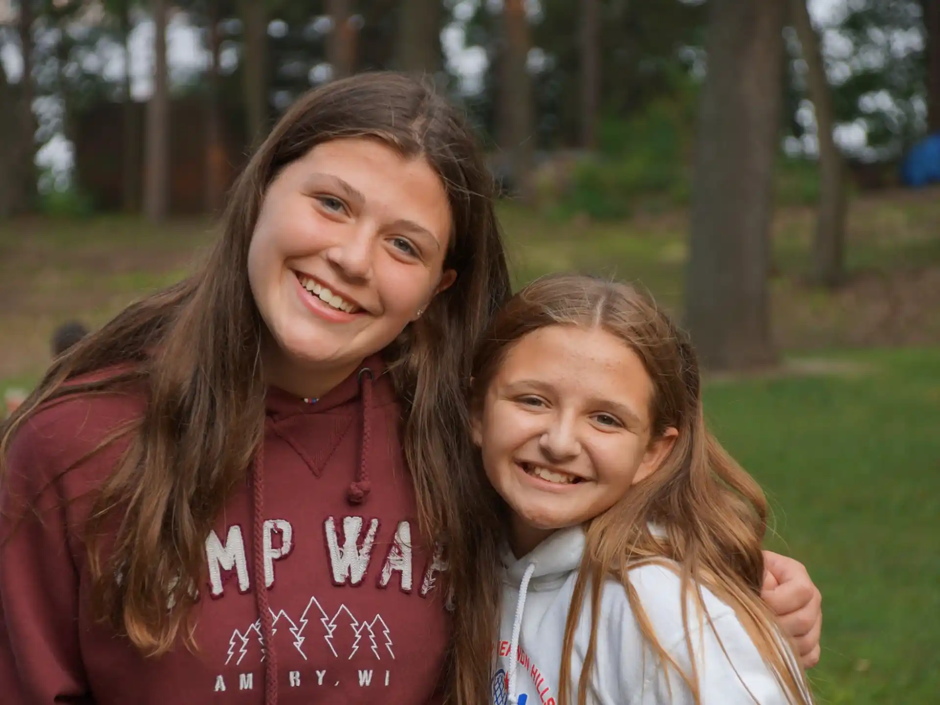 a person and a girl smiling