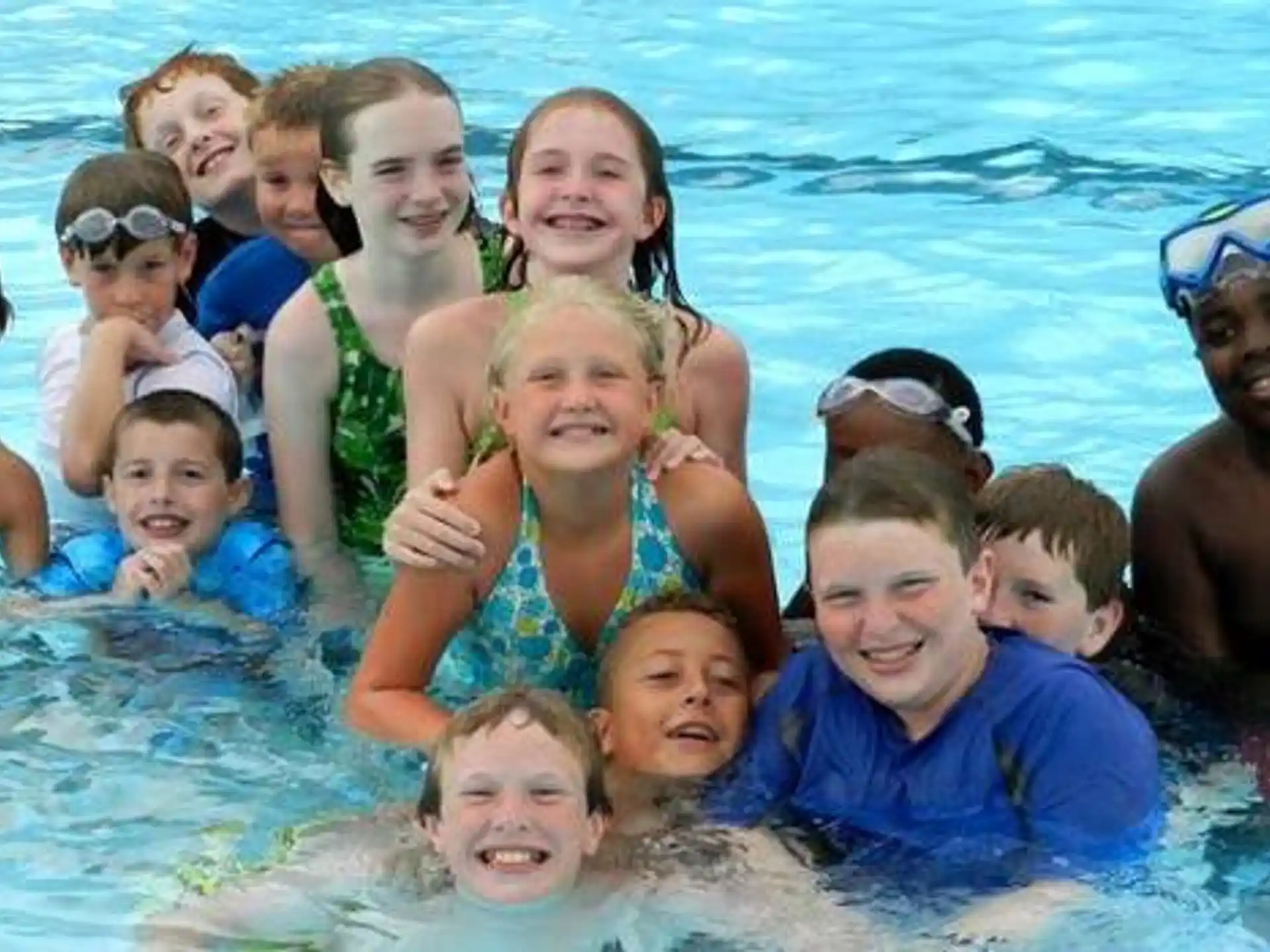 a group of people in a pool