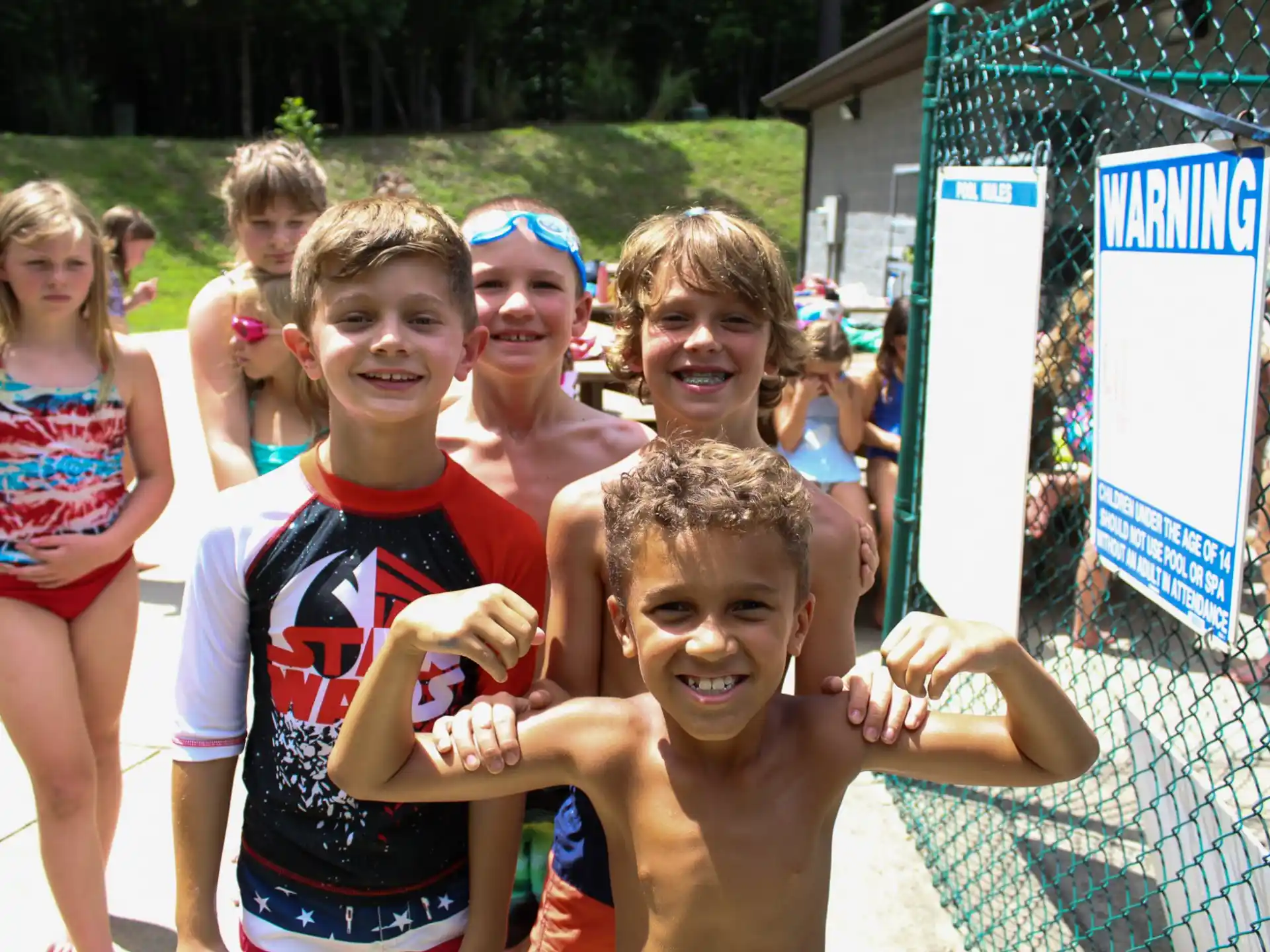 a group of kids posing for a picture