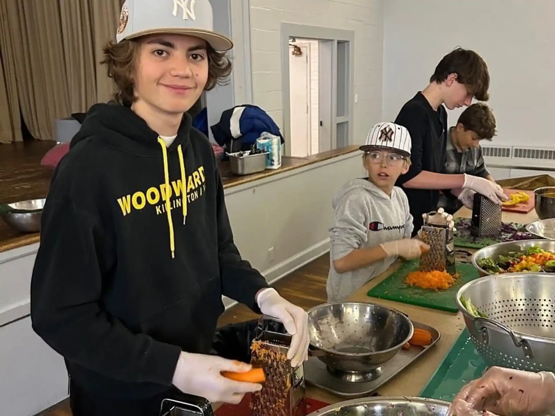 a group of people preparing food
