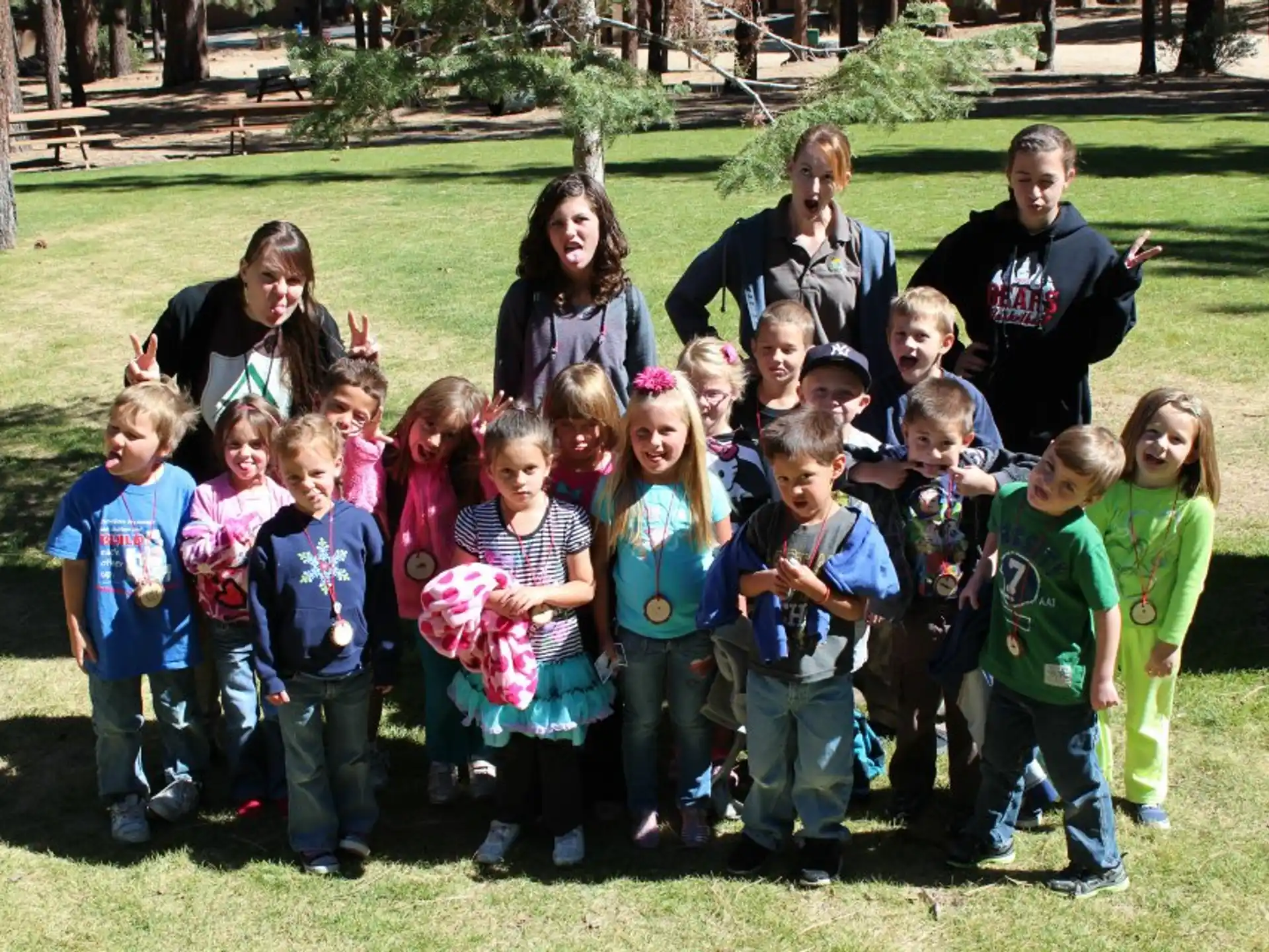 a group of people posing for a photo