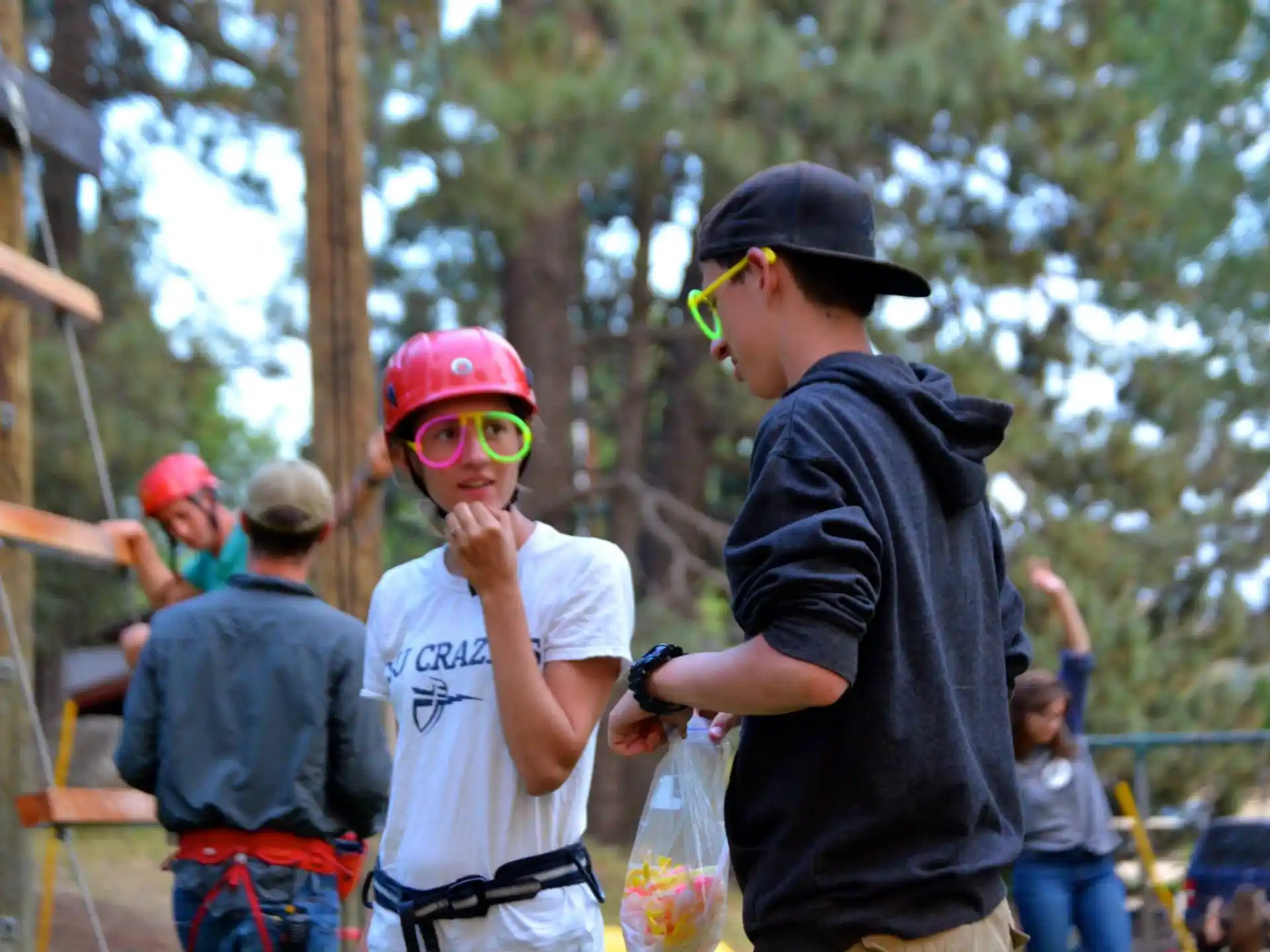 a person wearing a helmet and sunglasses