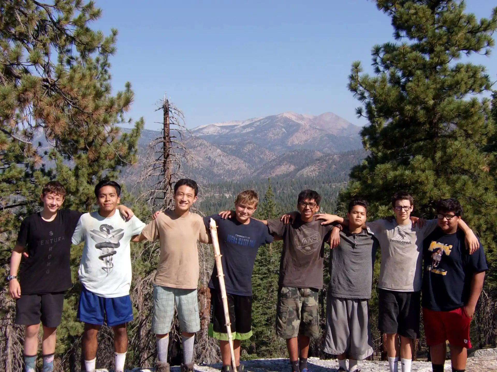 a group of men posing for a picture