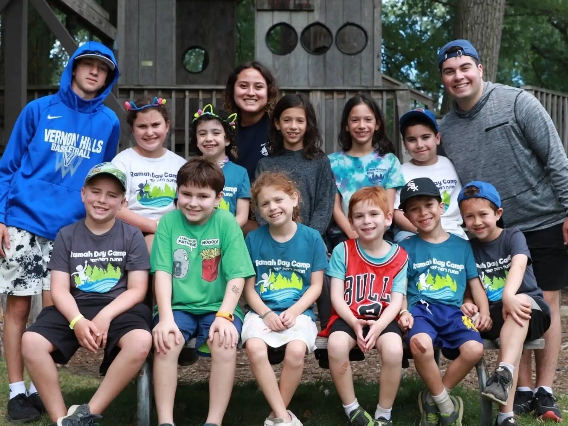 a group of people posing for a photo