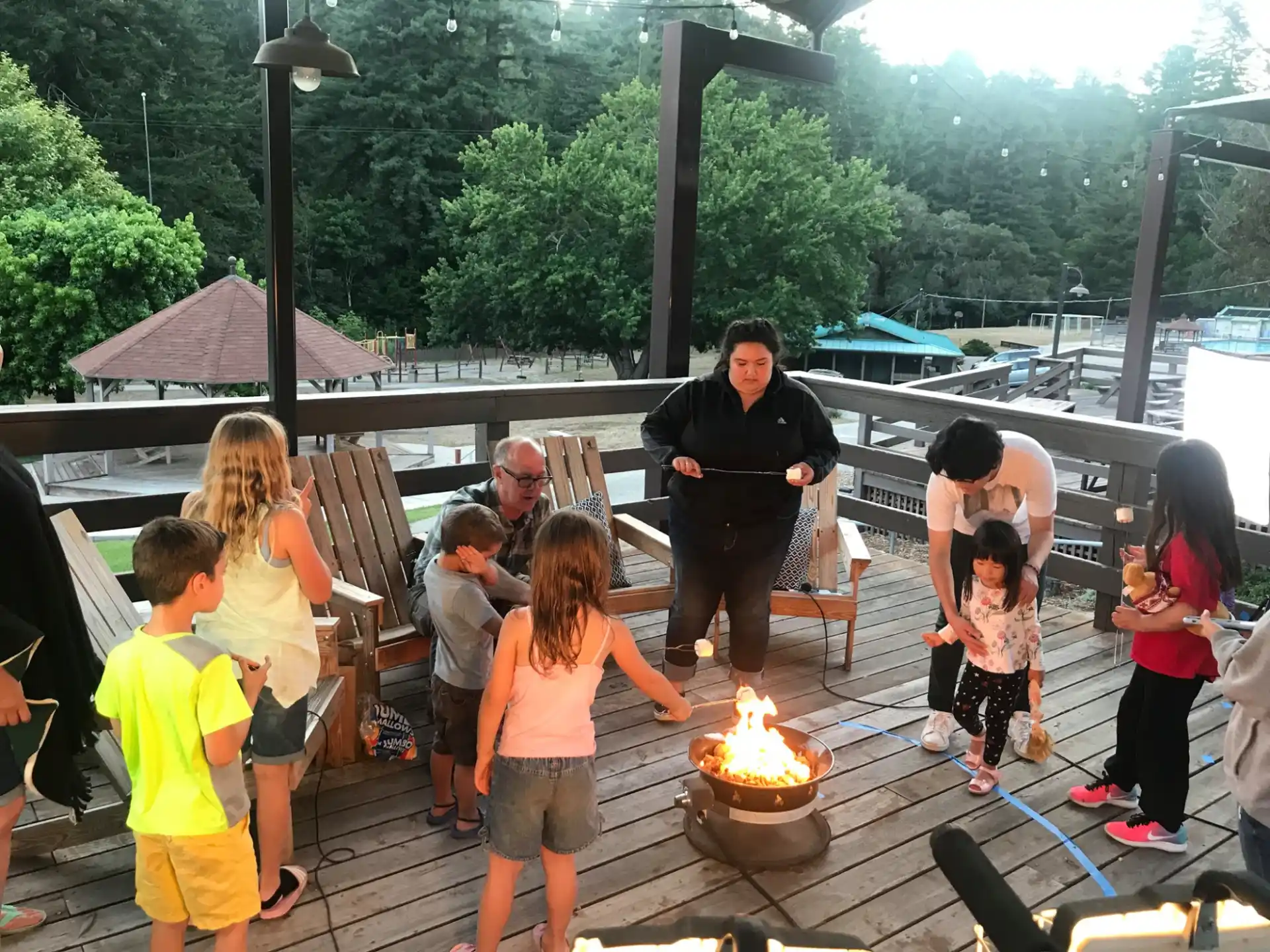 a group of people around a fire