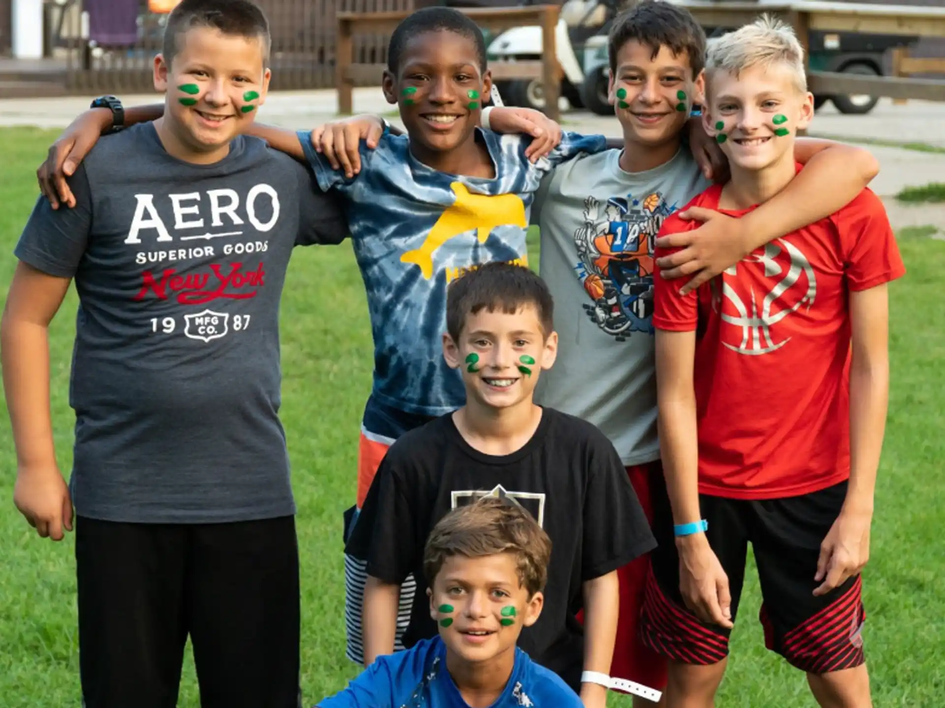 a group of boys posing for a picture