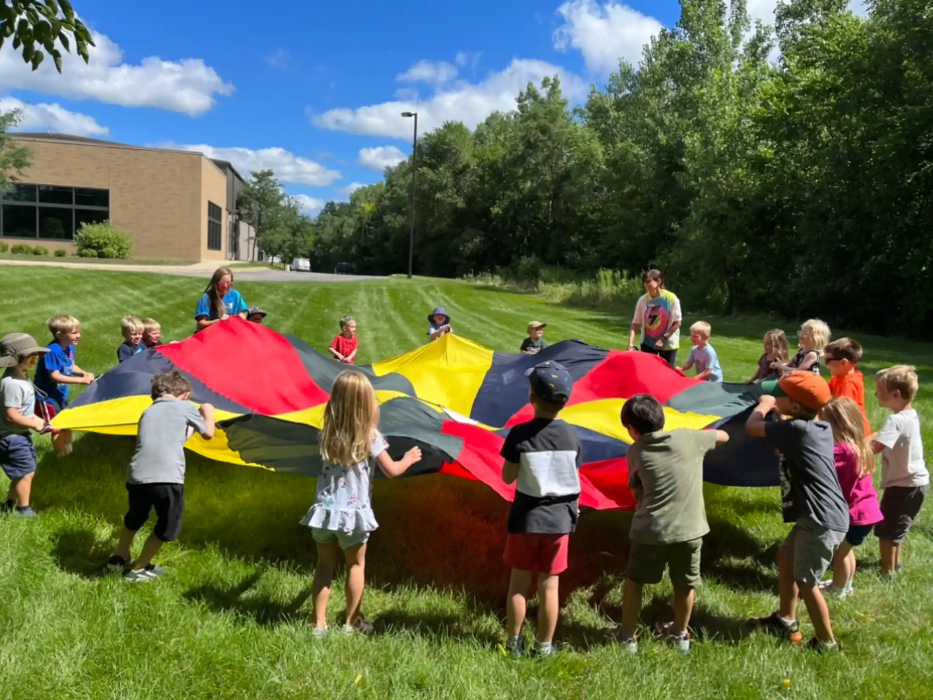 a group of people holding up tents