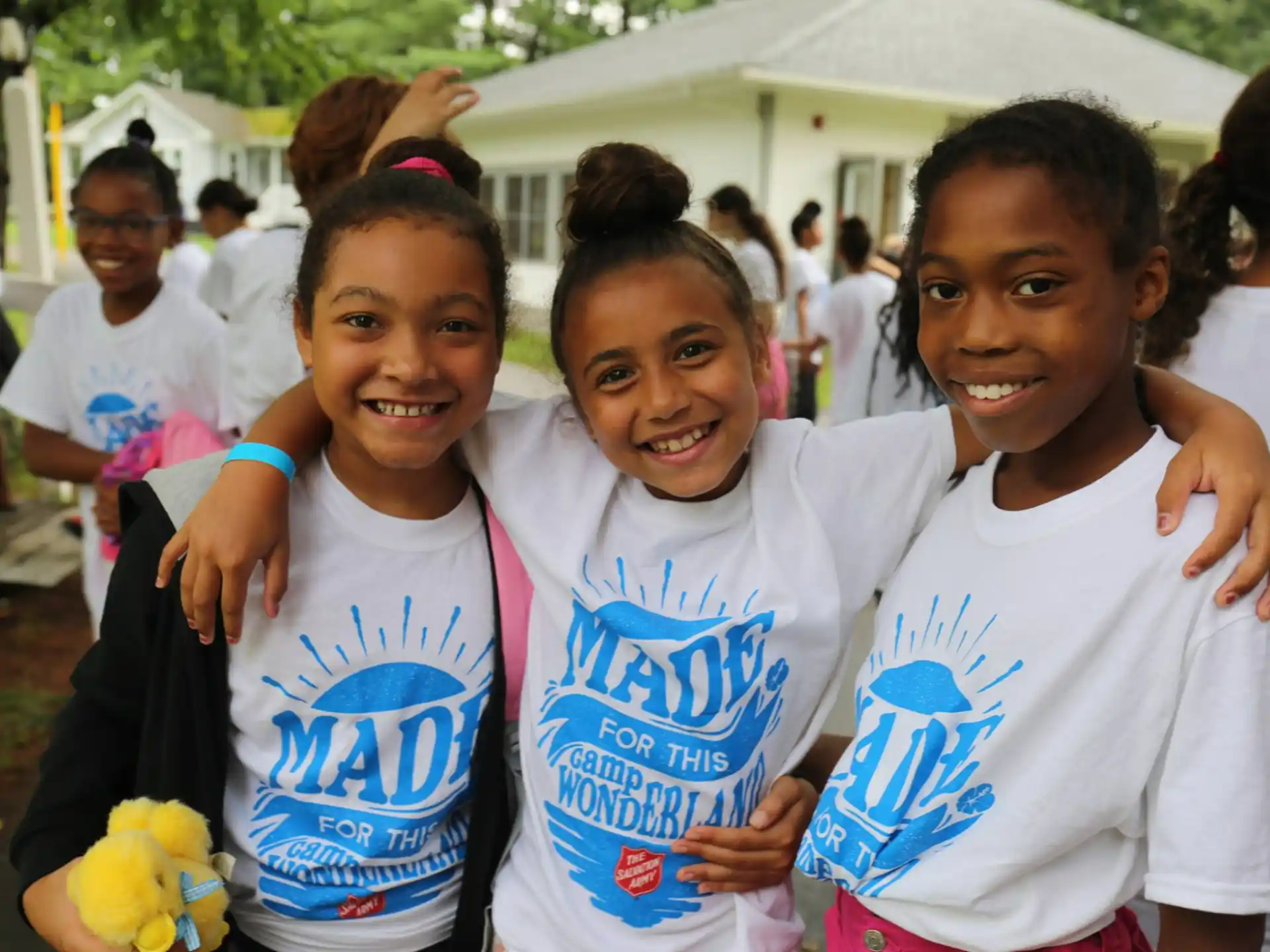 a group of girls smiling