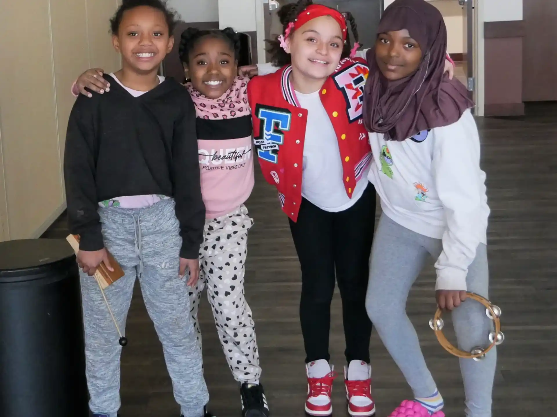 a group of girls posing for a picture
