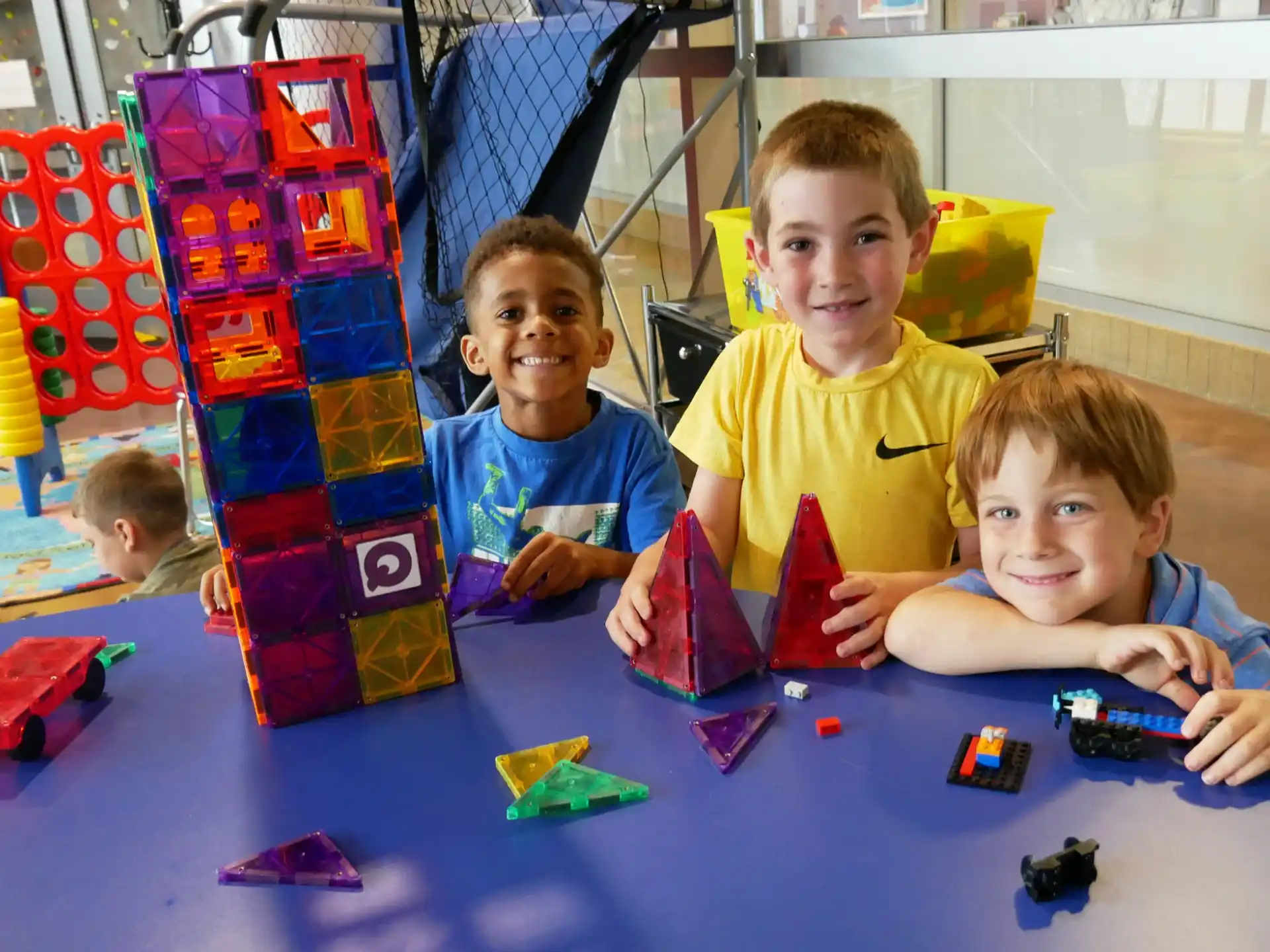 a group of kids playing with toys
