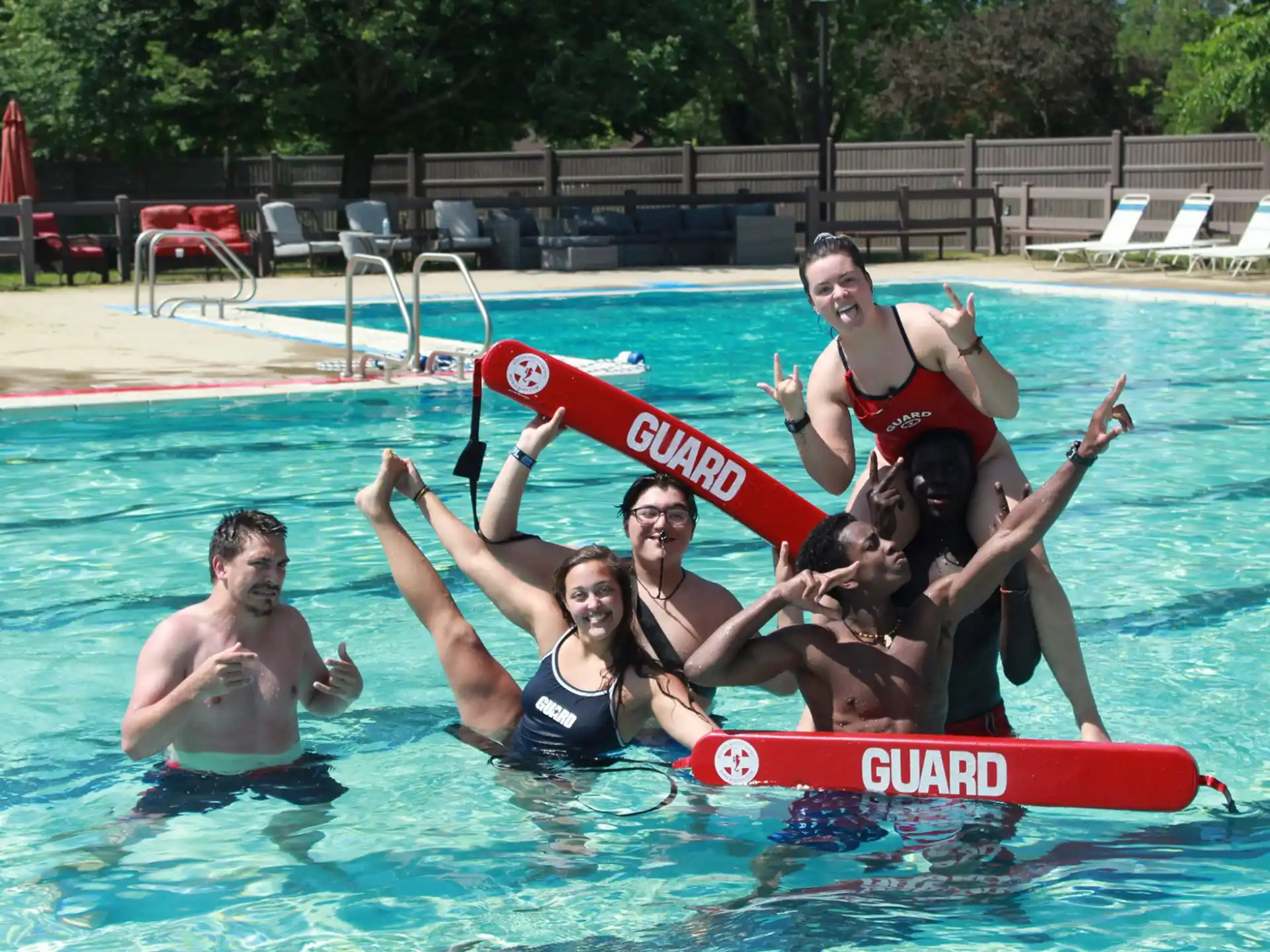 a group of people in a pool
