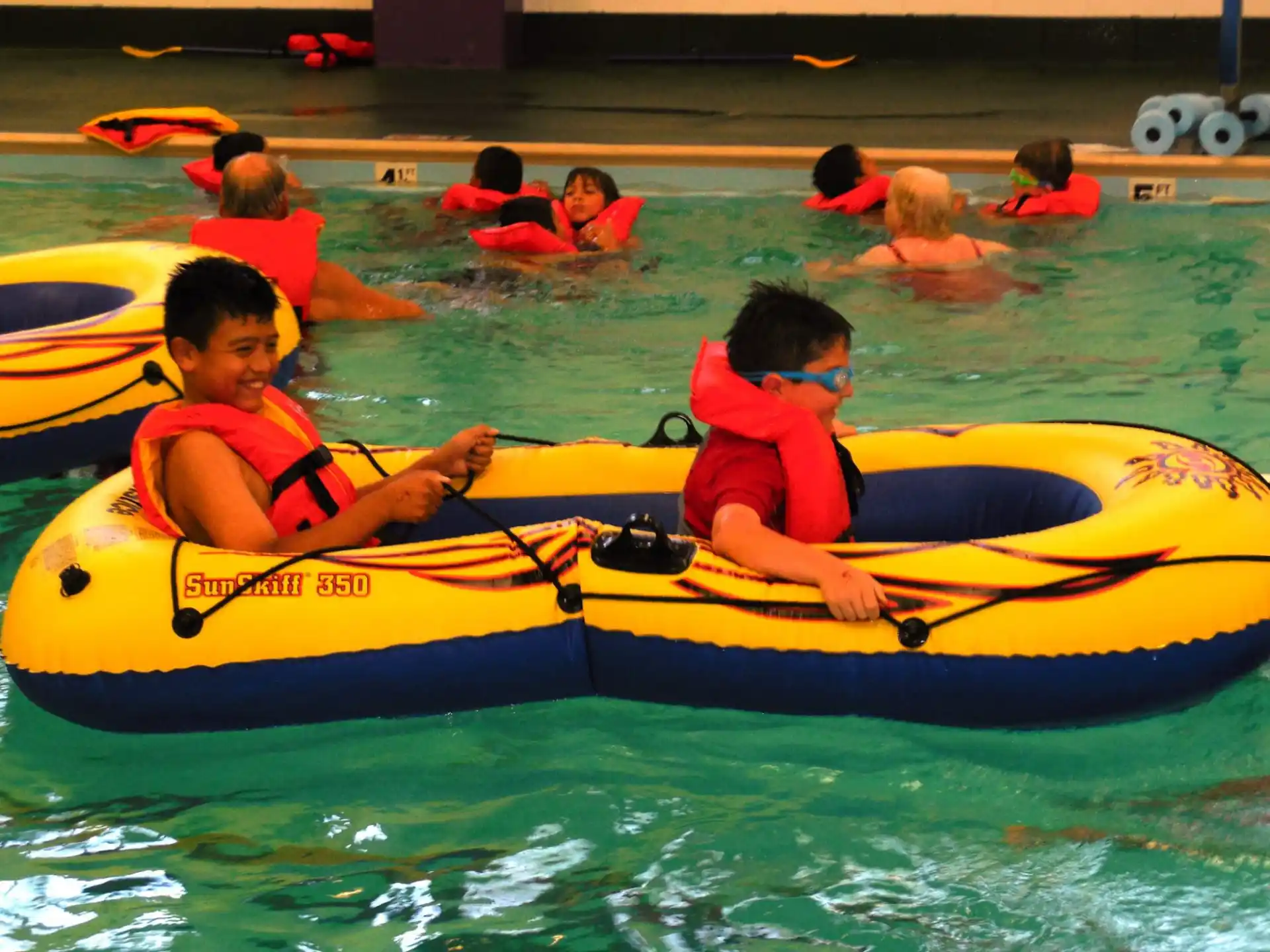 a group of people in a raft