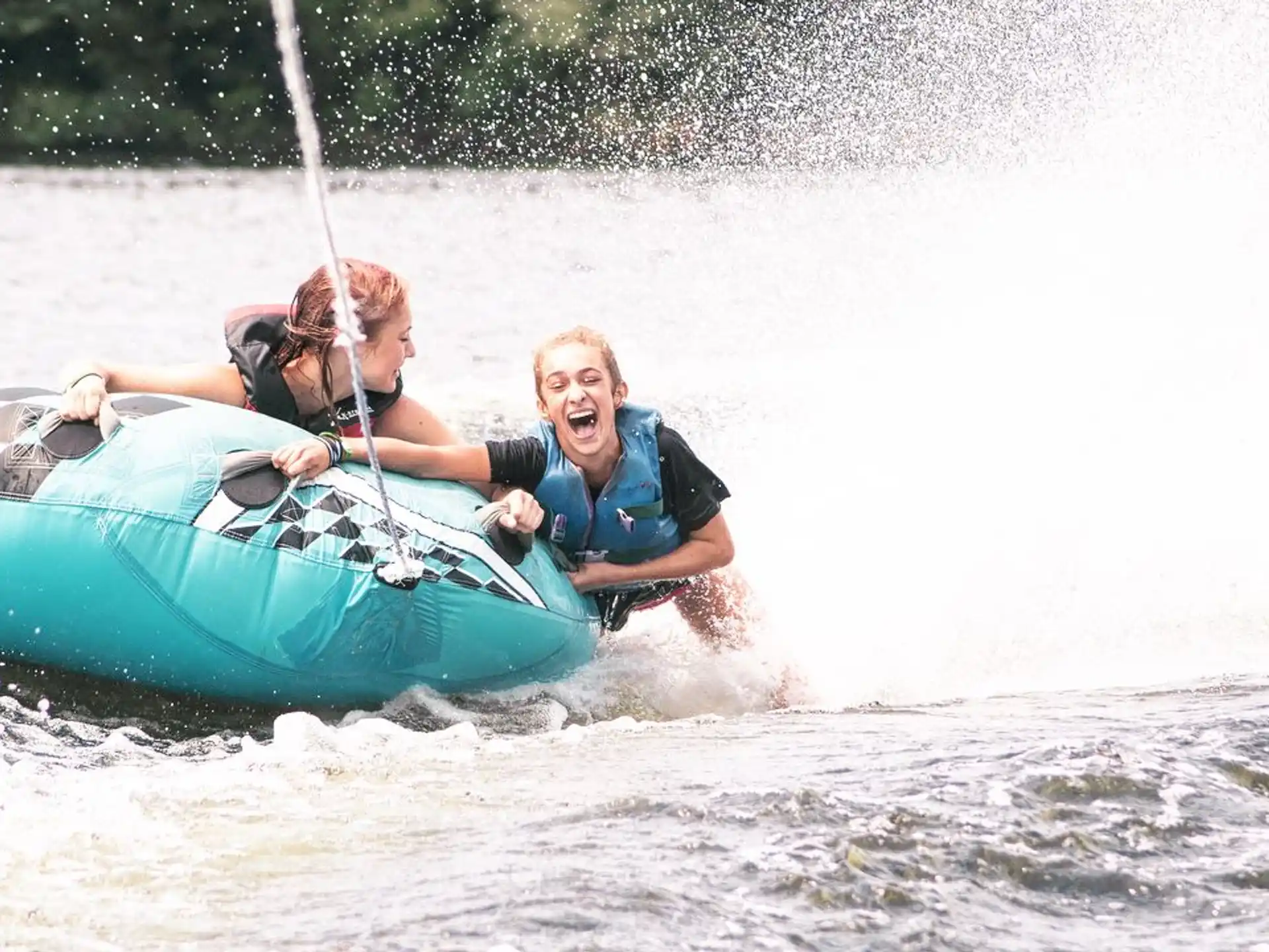 a couple of people in a raft