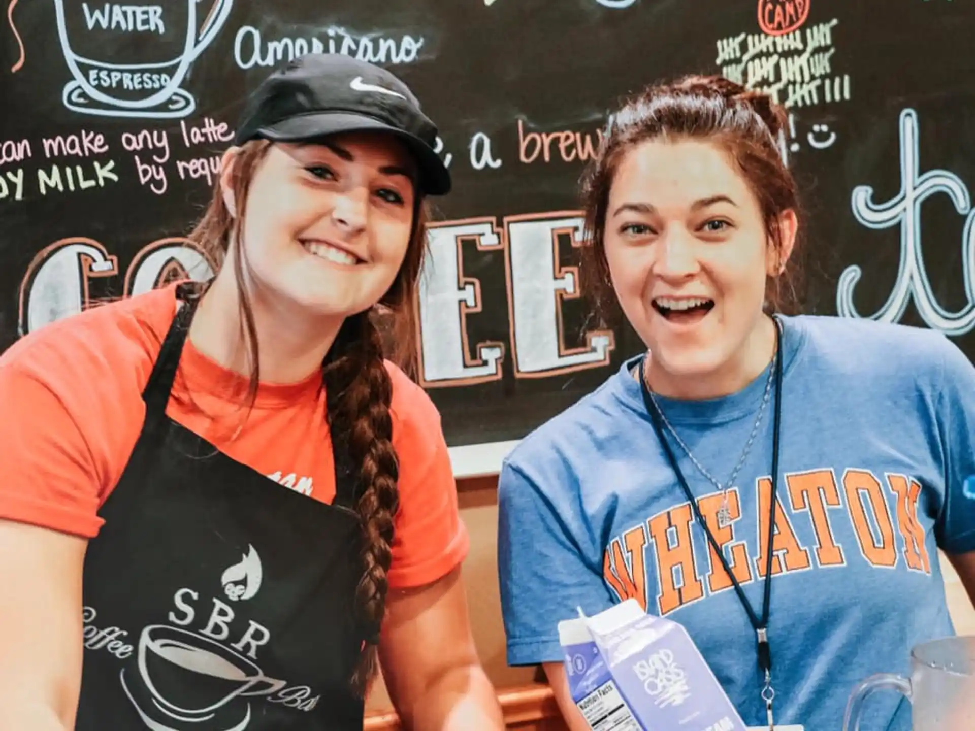a couple of women smiling