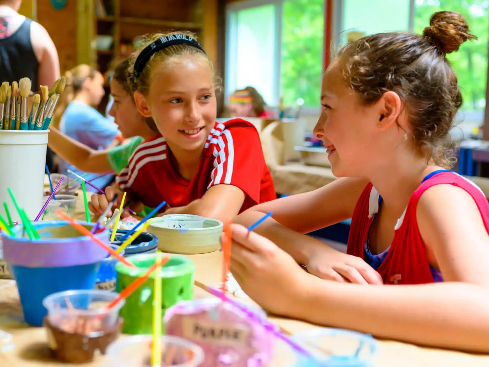 a few young girls painting