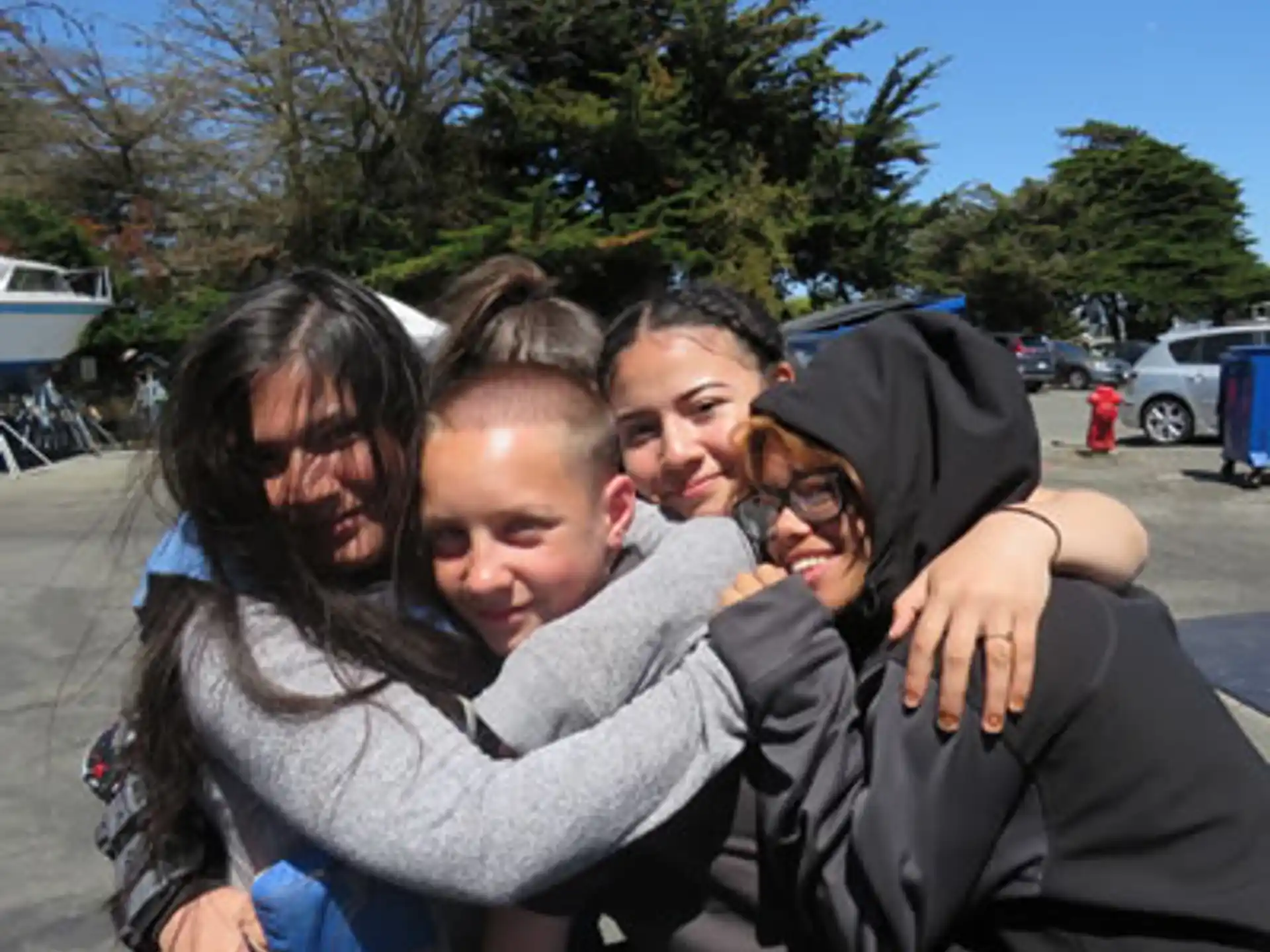 a group of people posing for the camera