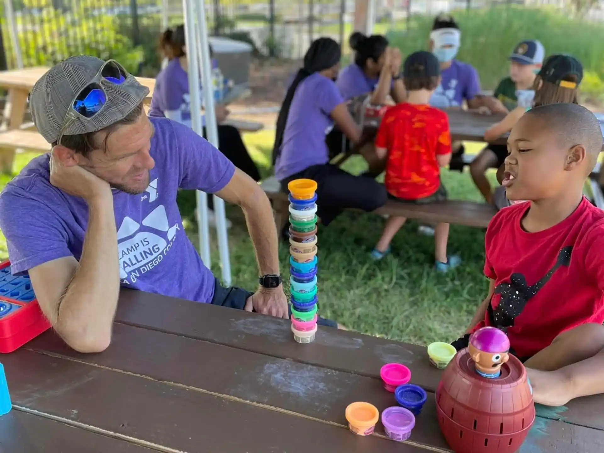 a person and a boy playing a game