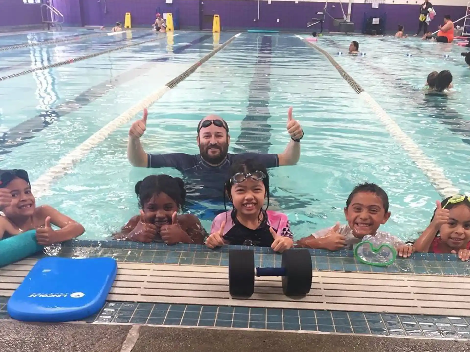 a group of people in a pool