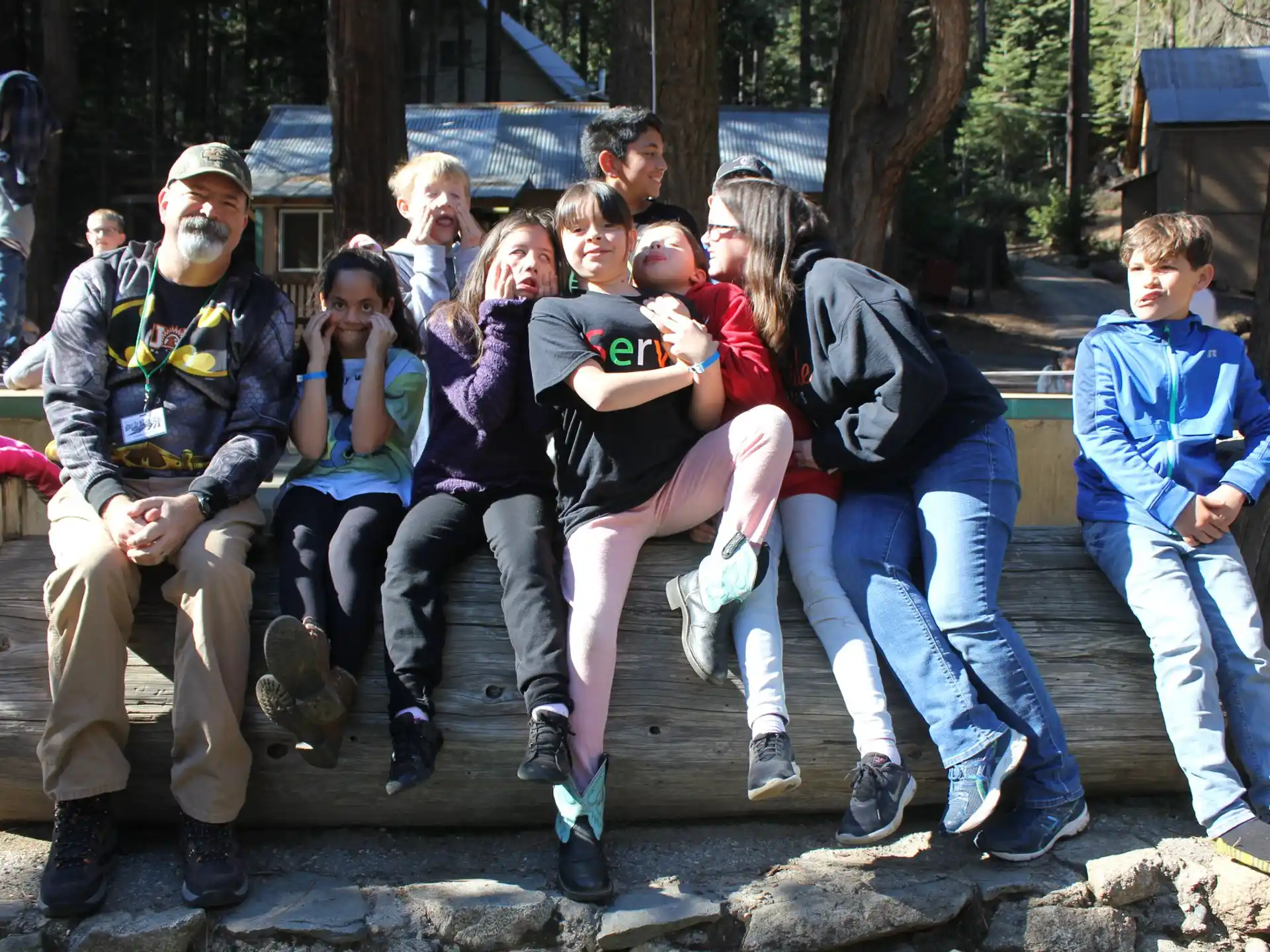 a group of people posing for a photo
