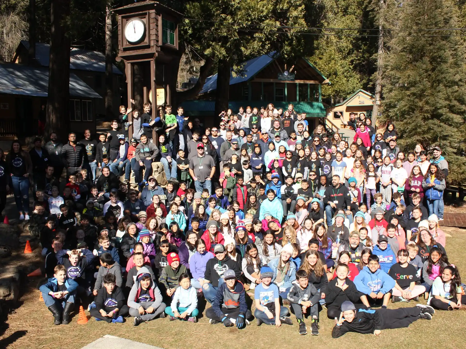 a large group of people posing for a photo