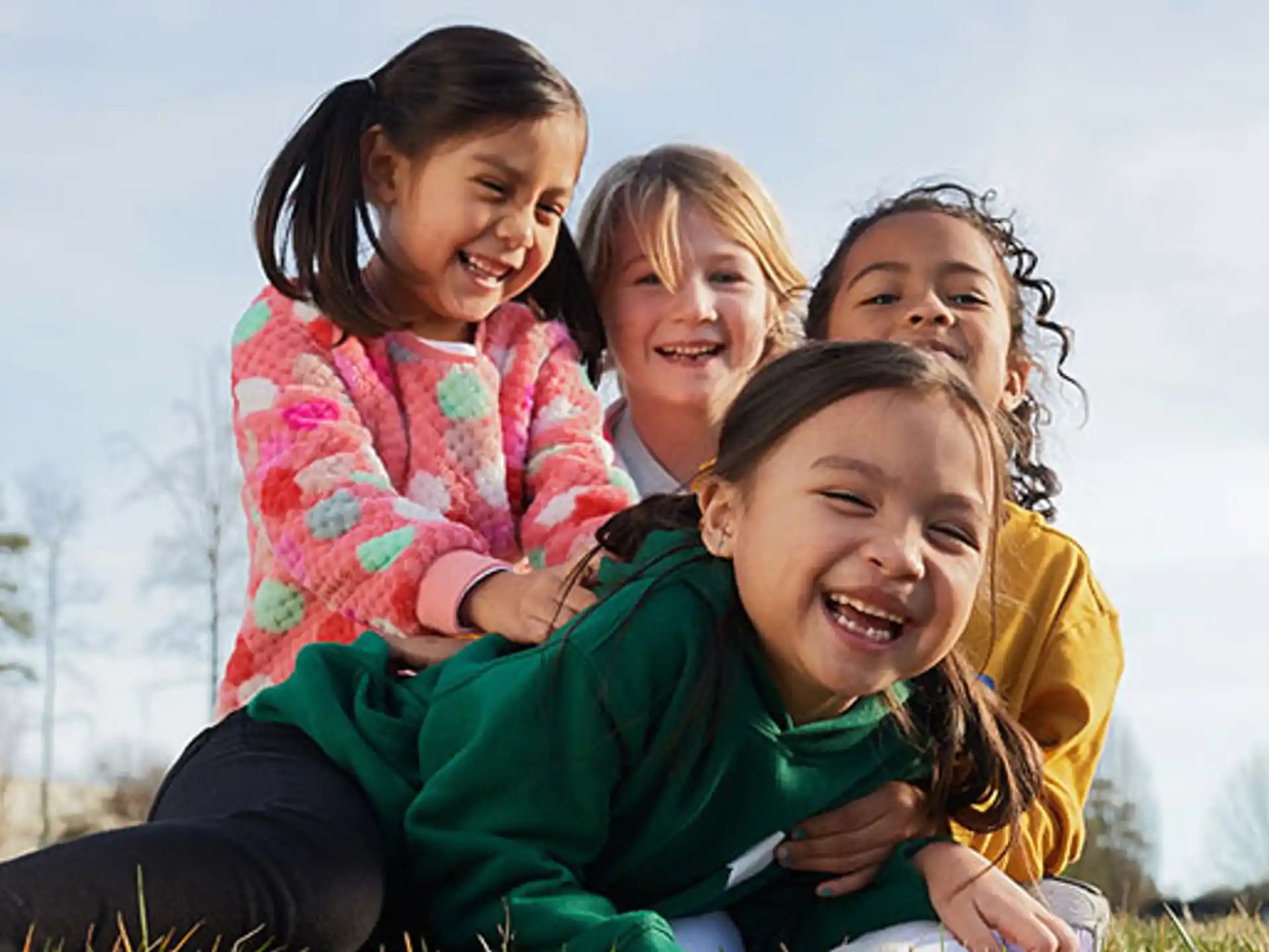 a group of girls smiling