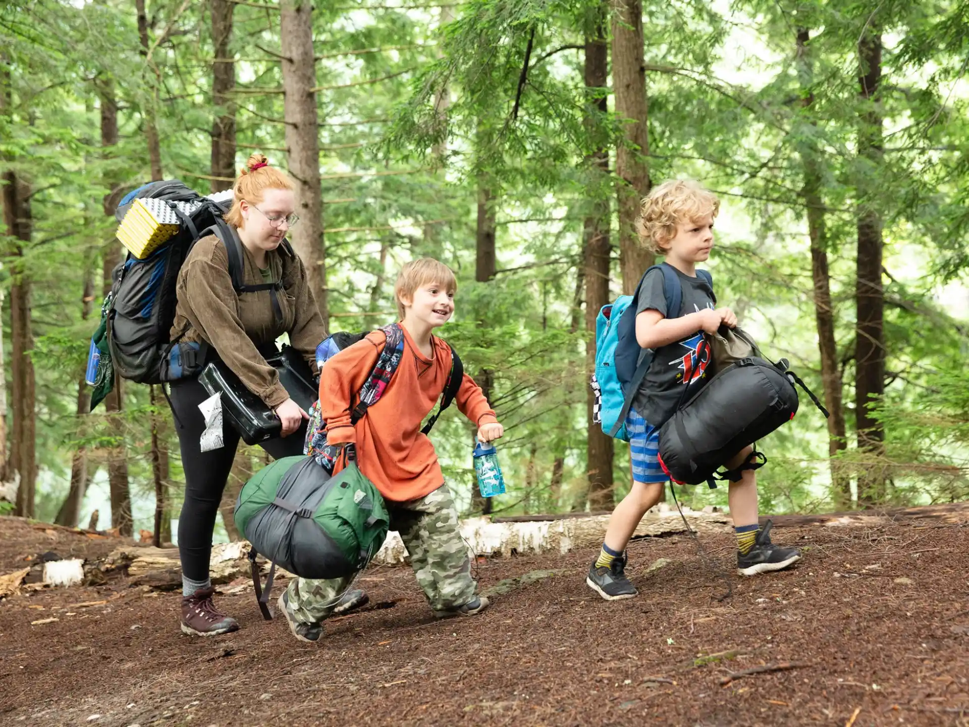 a group of people hiking in the woods