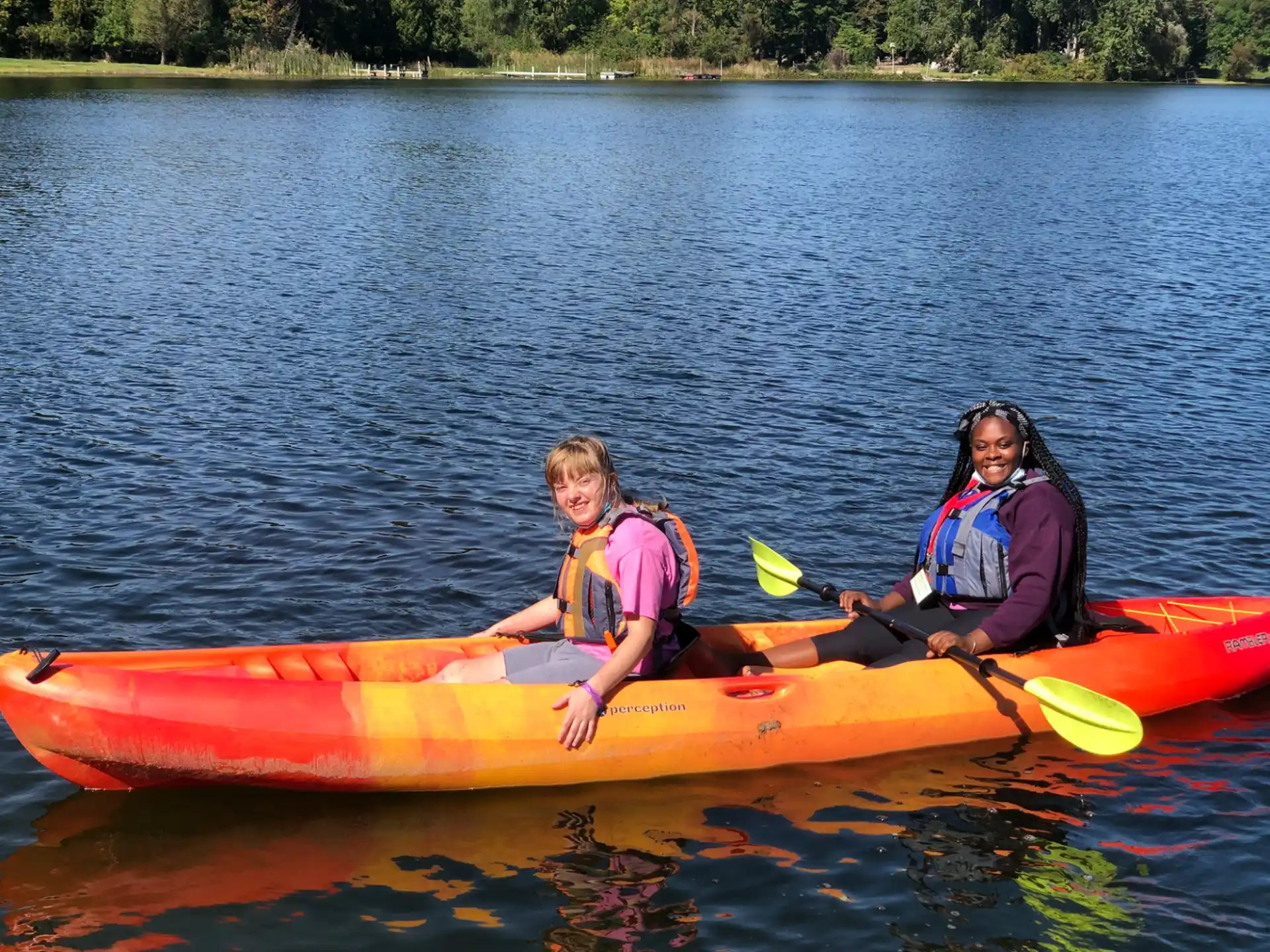 a group of people in a canoe