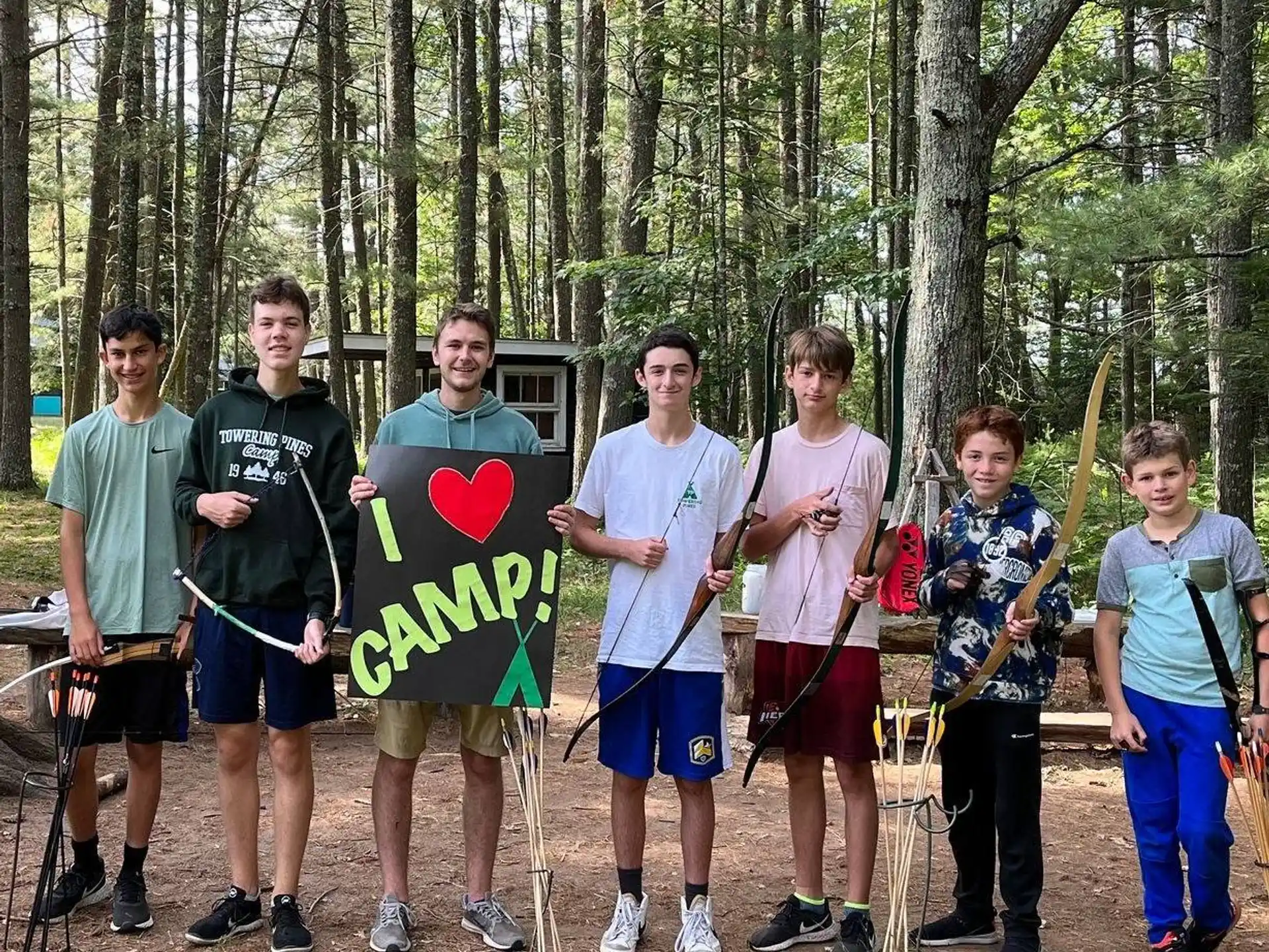 a group of people holding a sign