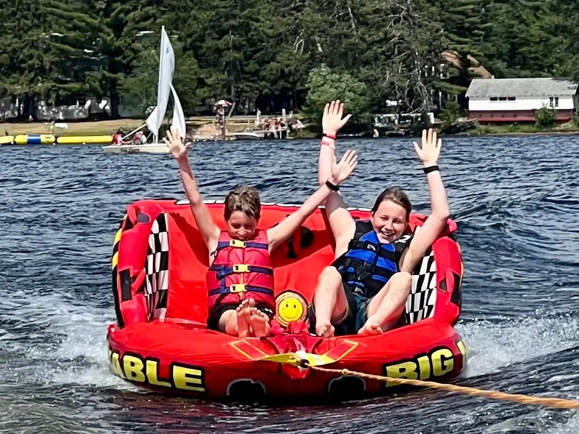 a group of people in a canoe