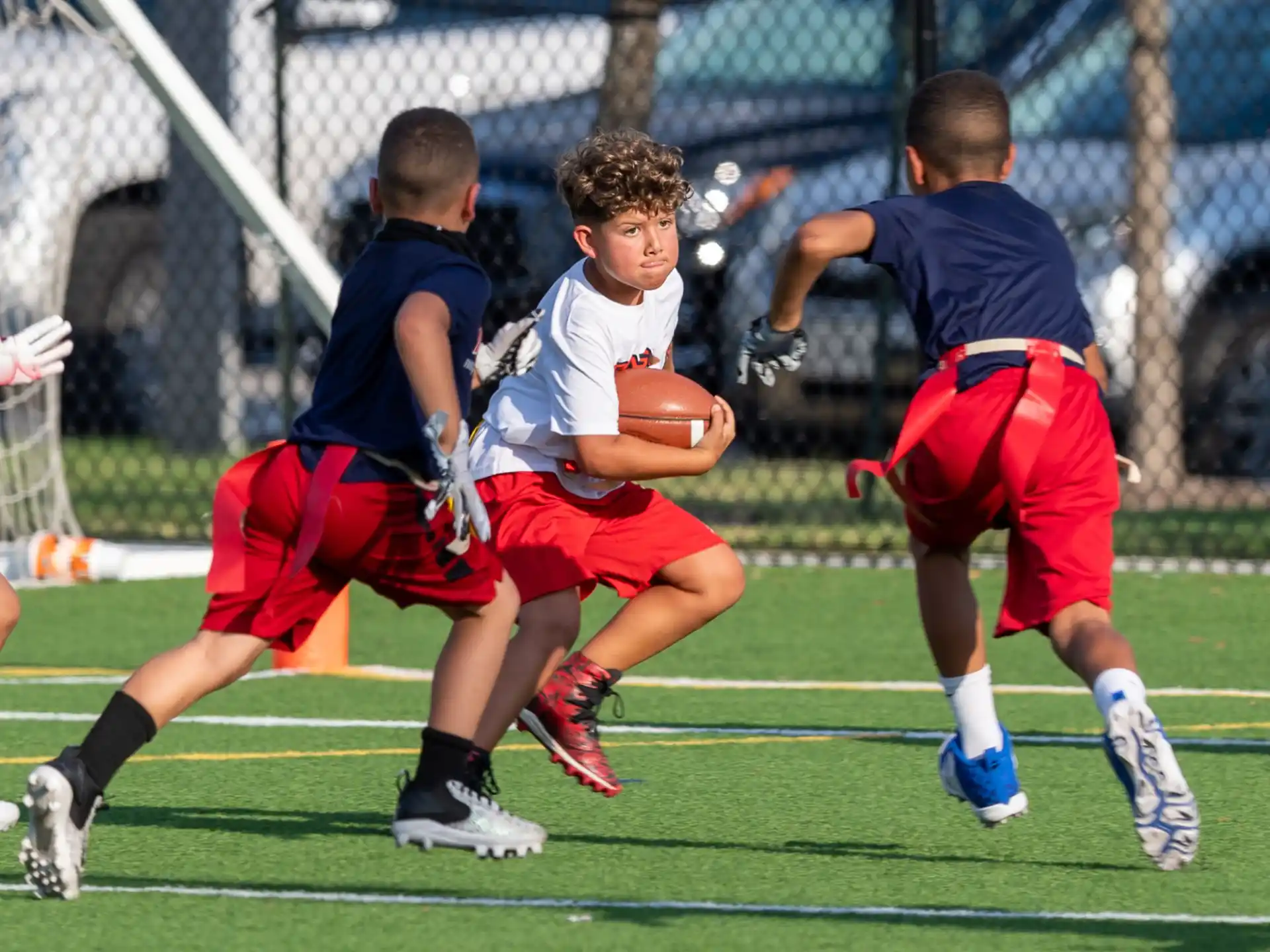 a group of boys playing football