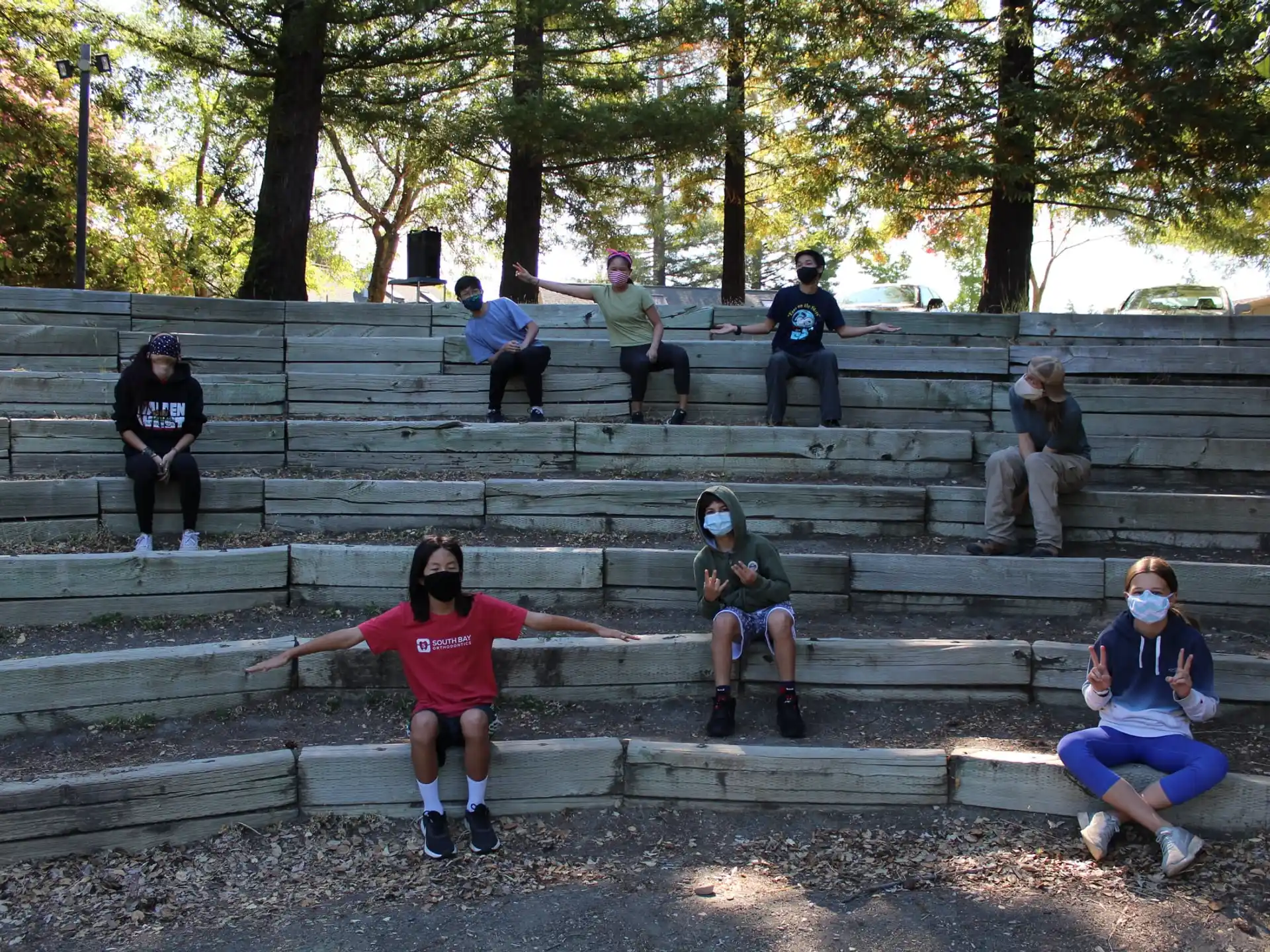 a group of people sitting on stairs