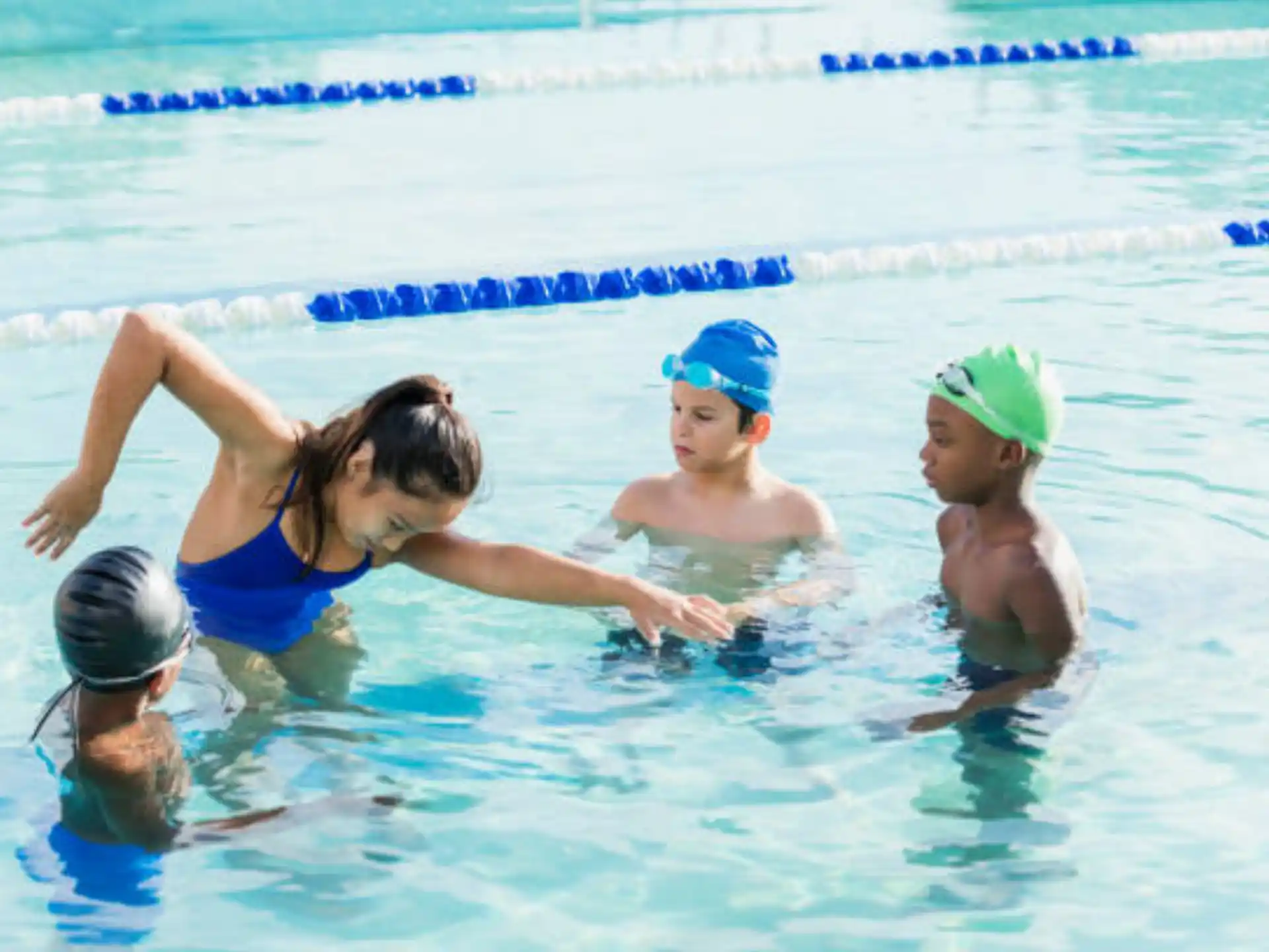 a group of people in a pool