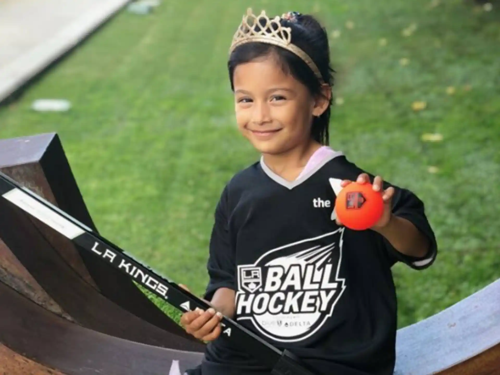 a girl holding a baseball bat