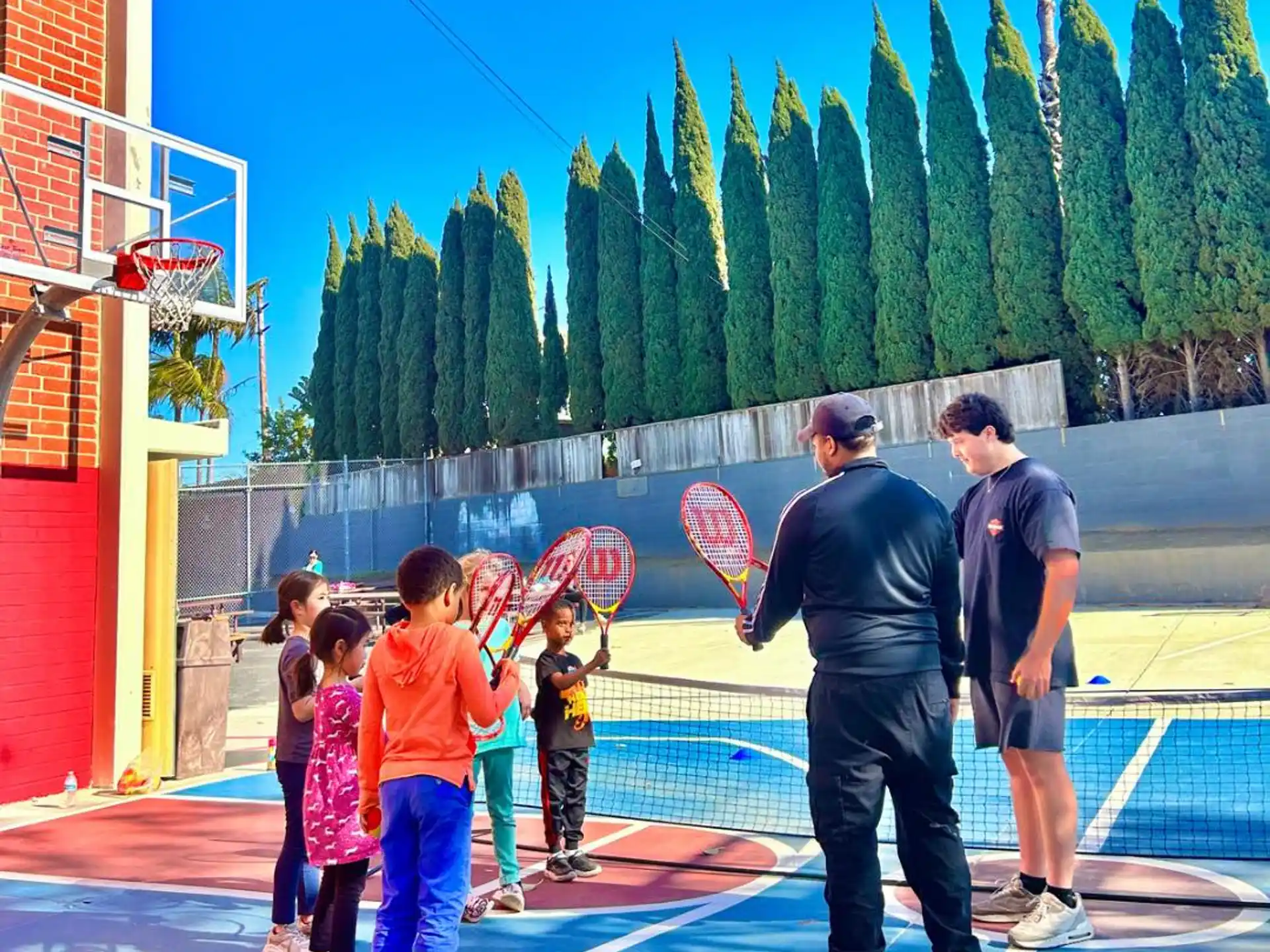 a group of people holding hoops