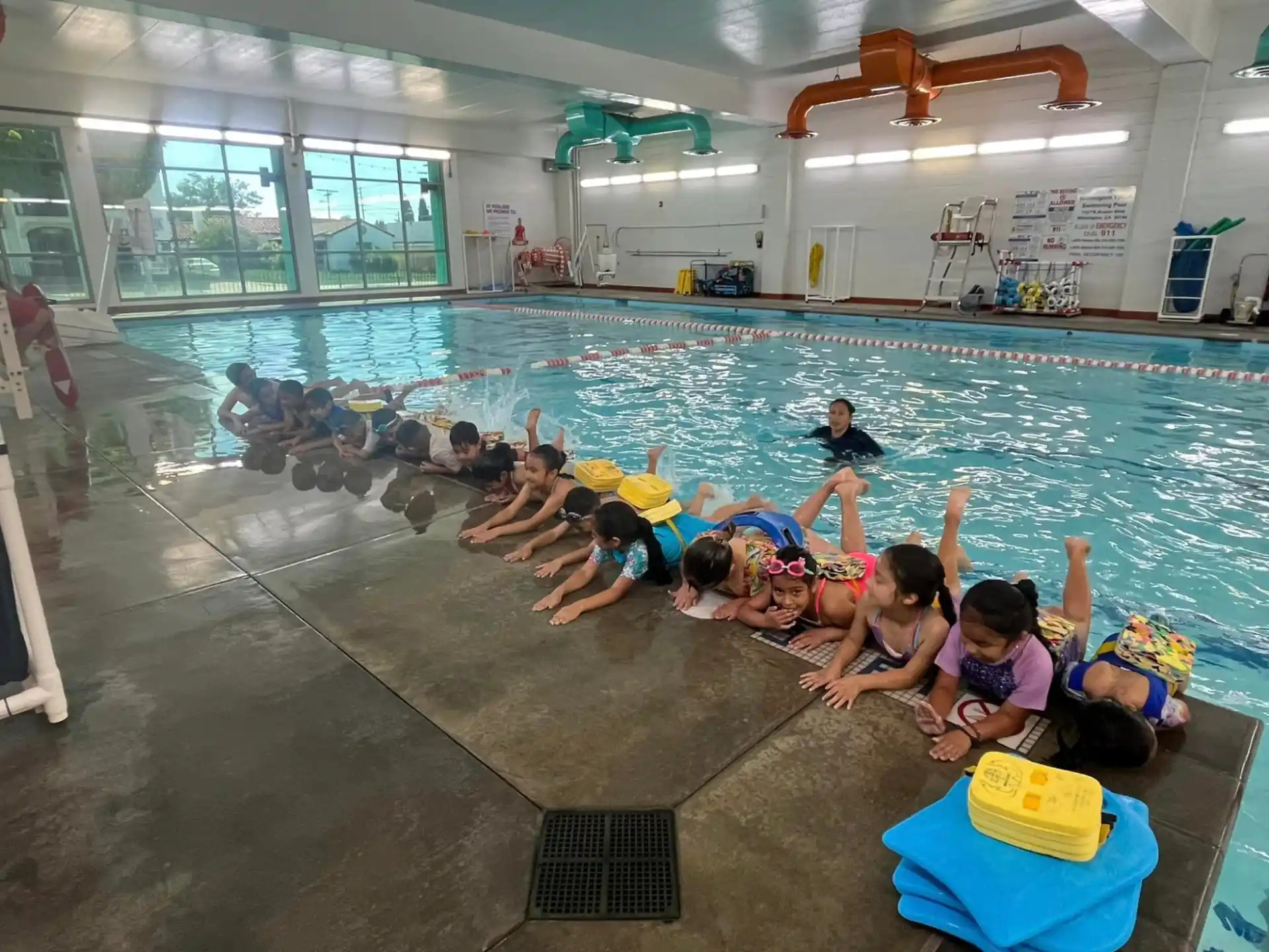 a group of people in a swimming pool