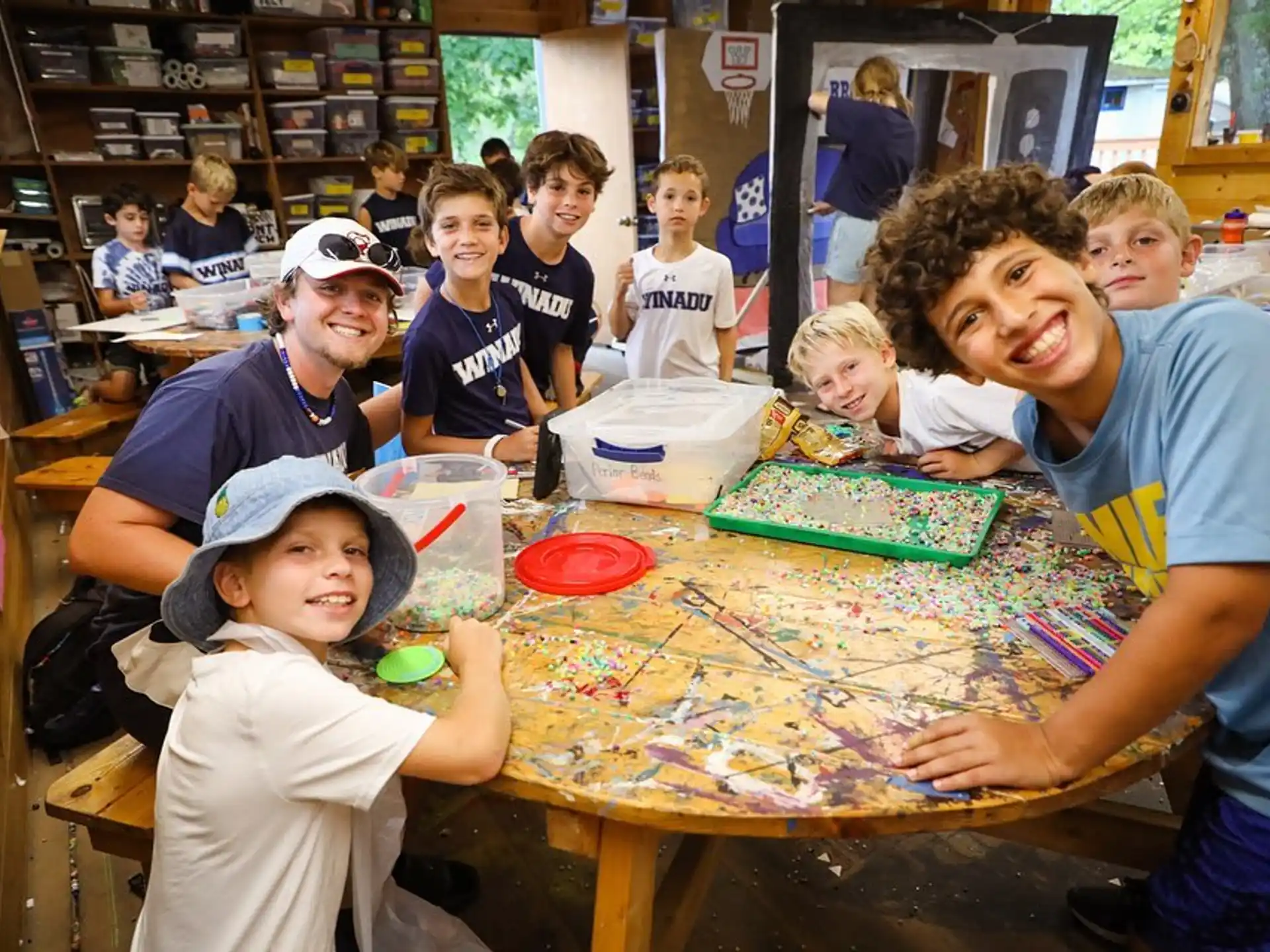 a group of children sitting at a table