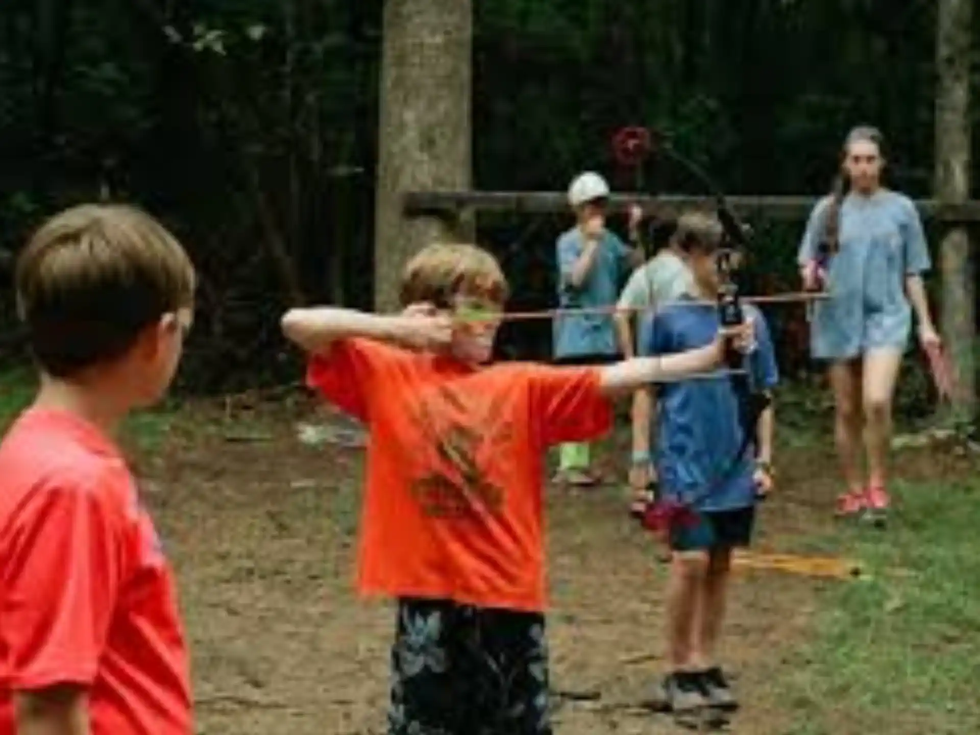 a group of kids playing with bubbles