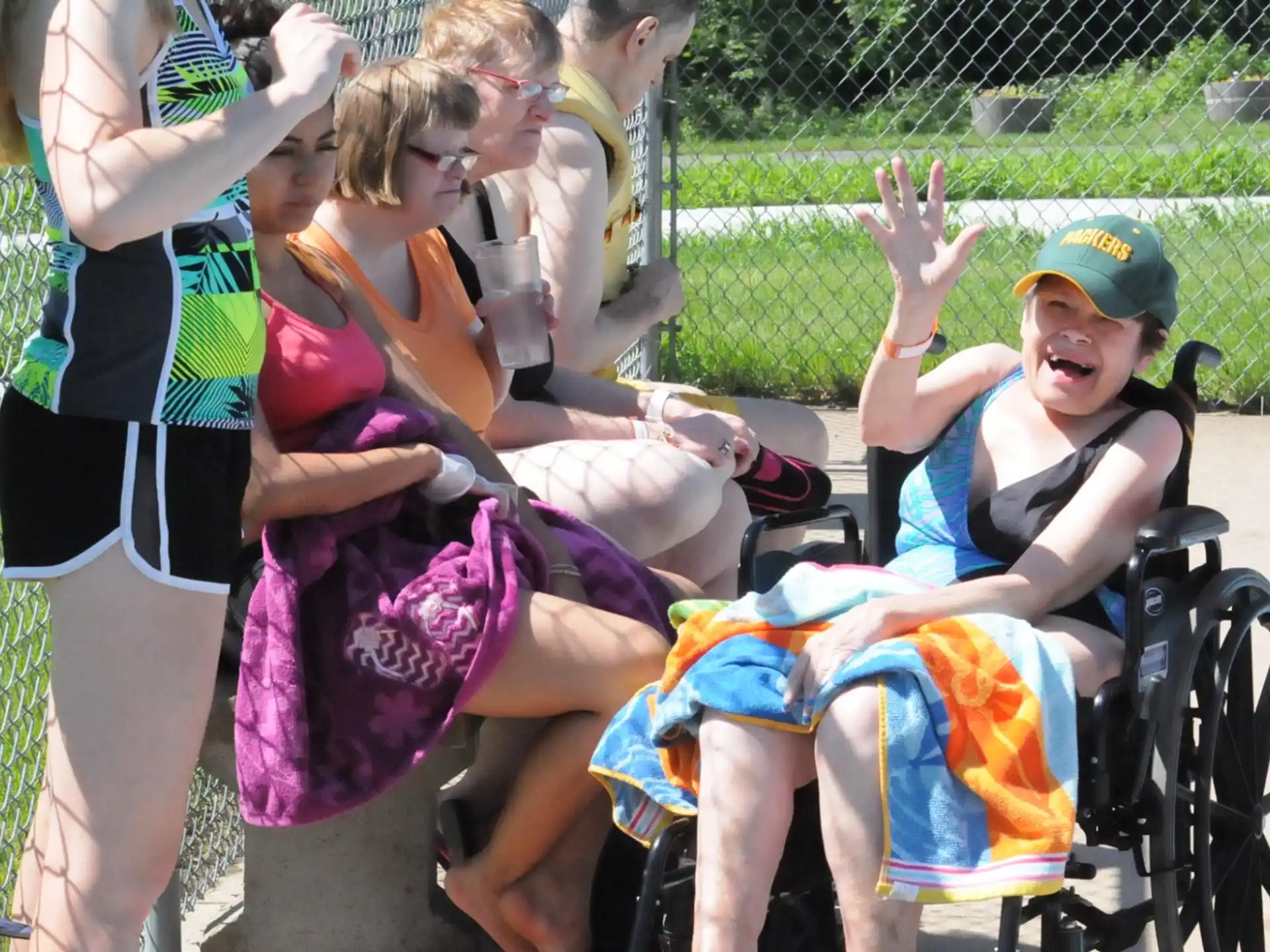 a group of people in a wheelchair