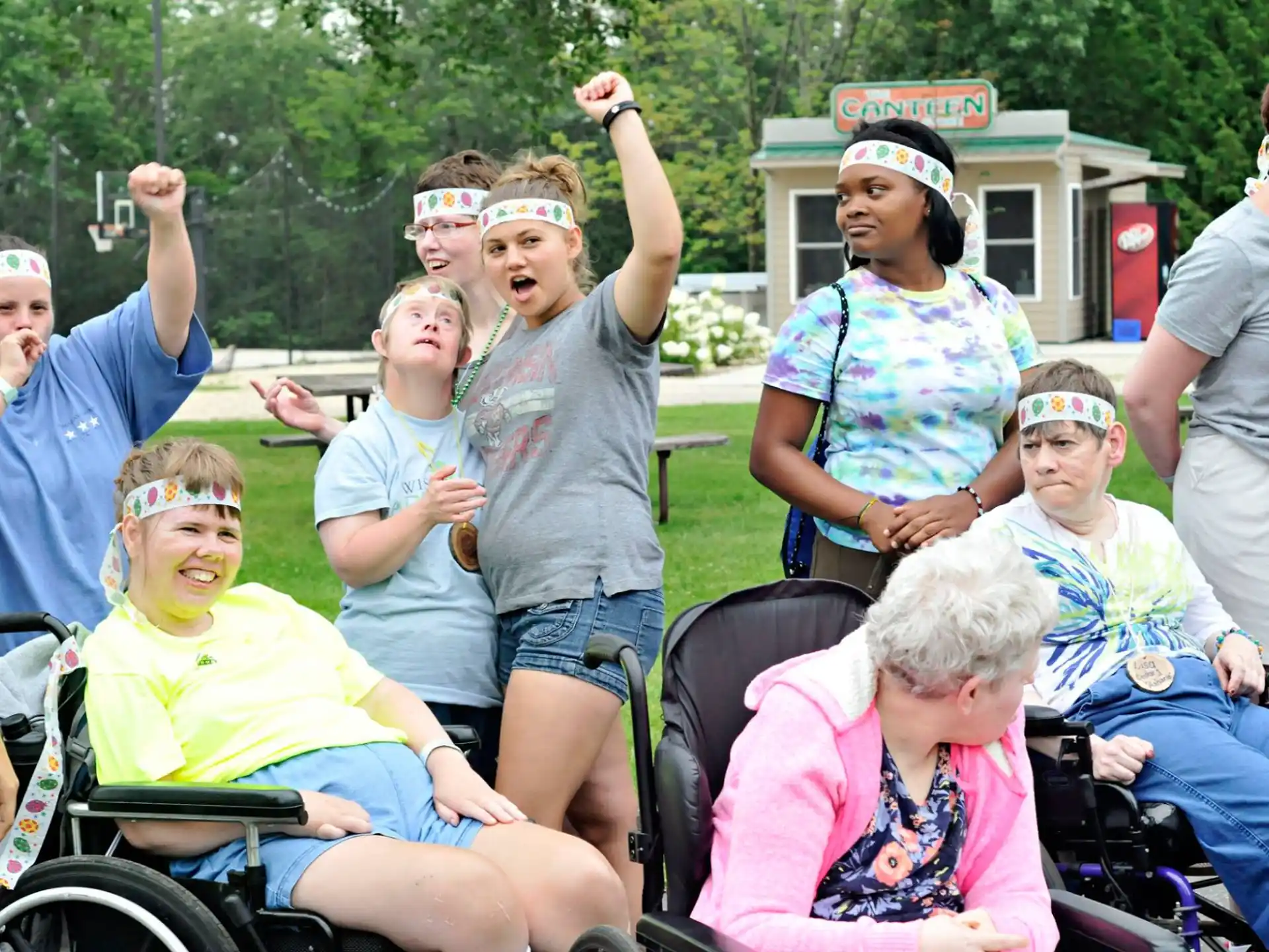 a group of people in wheelchairs