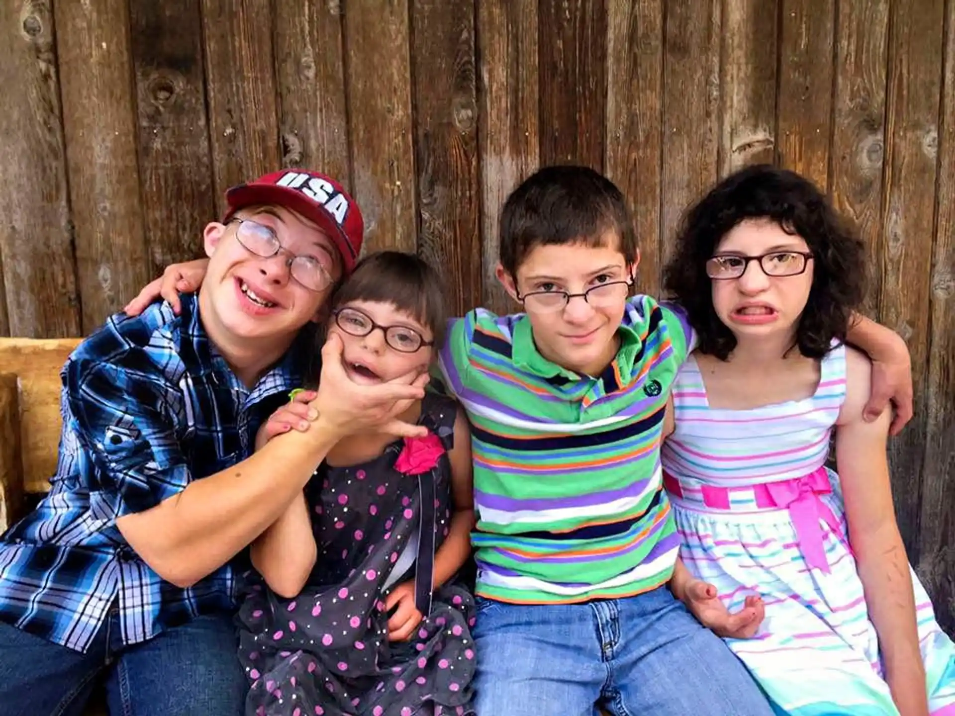 a group of people posing for the camera
