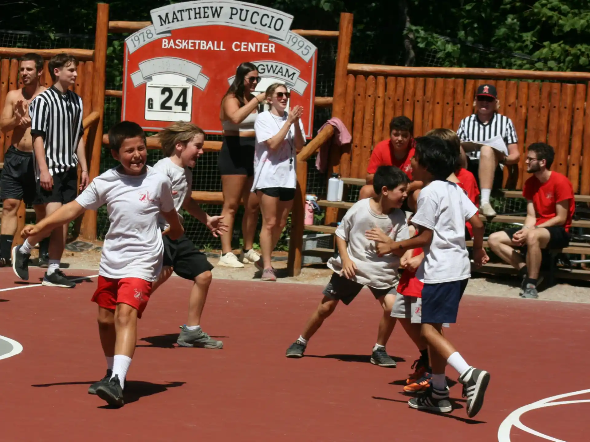 a group of people running on a track