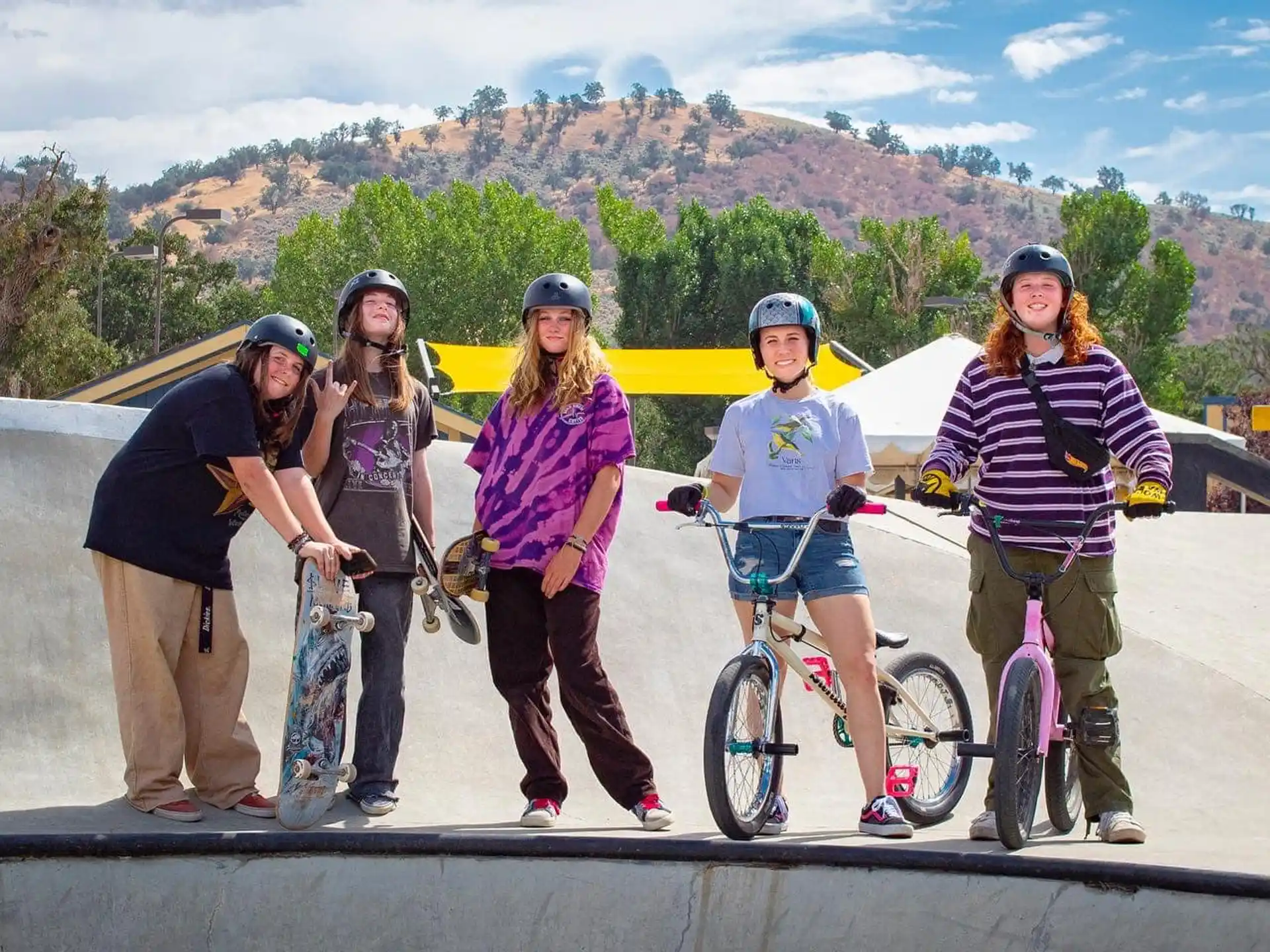 a group of people with bicycles