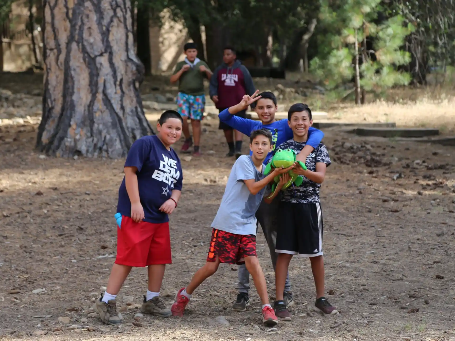 a group of boys holding a ball