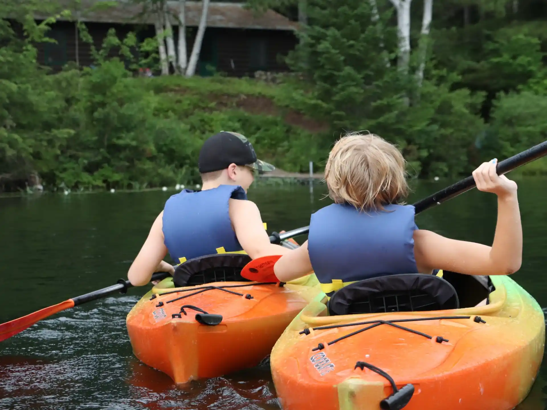 a couple of people in a canoe